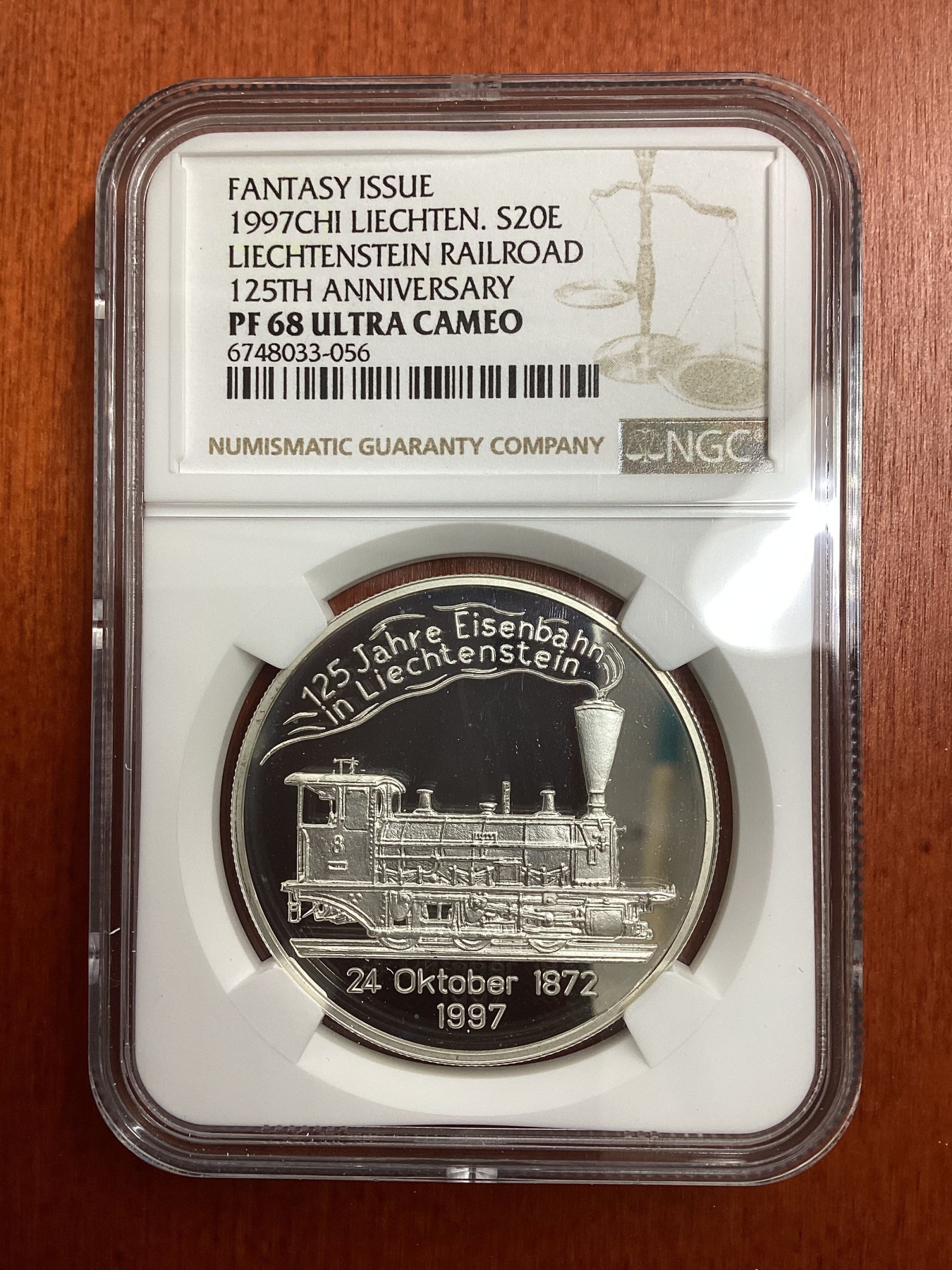 长老汇龙年精选第二场 1997CHI LIECHTEN. 列支敦士登火车125周年20欧元精制银币，NGC PF68UC，亚军分，更高分仅有5枚，臆造币
