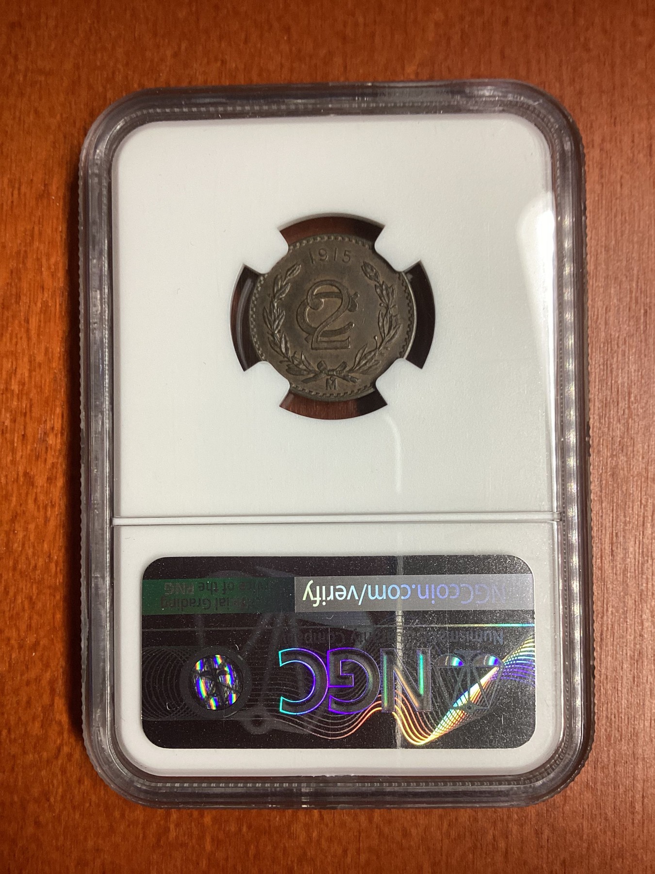 长老汇龙年精选第二场 1915Mo 墨西哥内战农民军起义领袖萨帕塔发行2分铜币，缩小版，NGC MS62BN