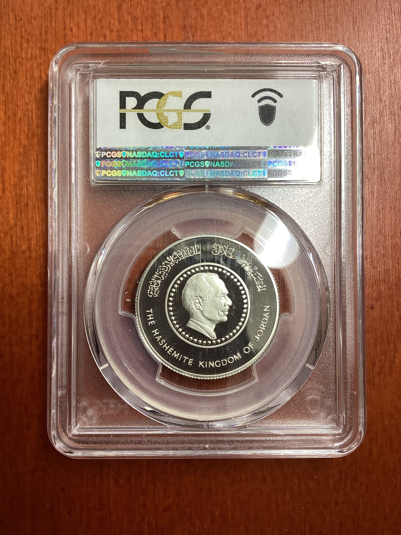 长老汇龙年精选第二场 AH1406-1985 约旦侯赛因国王50岁寿辰10第纳尔精制银币，PCGS PR69DCAM，唯一冠军分