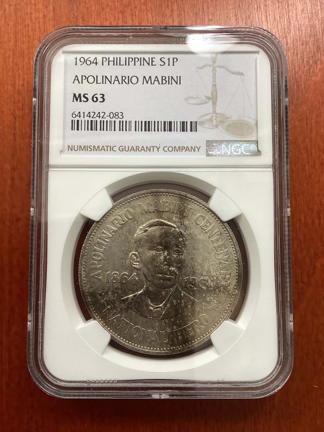 长老汇龙年精选第二场 1964菲律宾国家英雄系列马比尼1比索银币，NGC MS63分