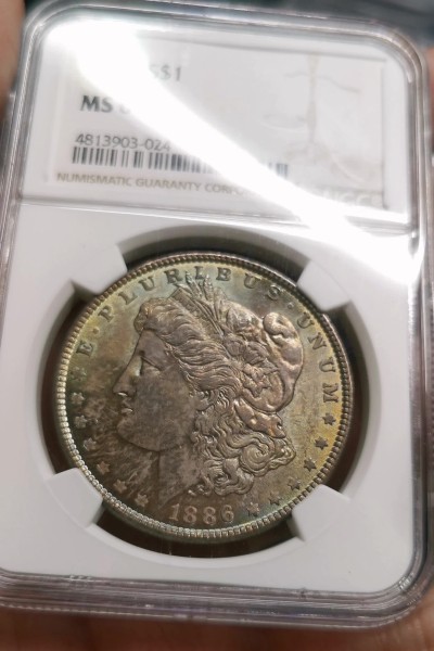 凡希社世界钱币微拍第二百六十二期 1886美国摩根壹元NGC-MS64青金+紫金双面彩！