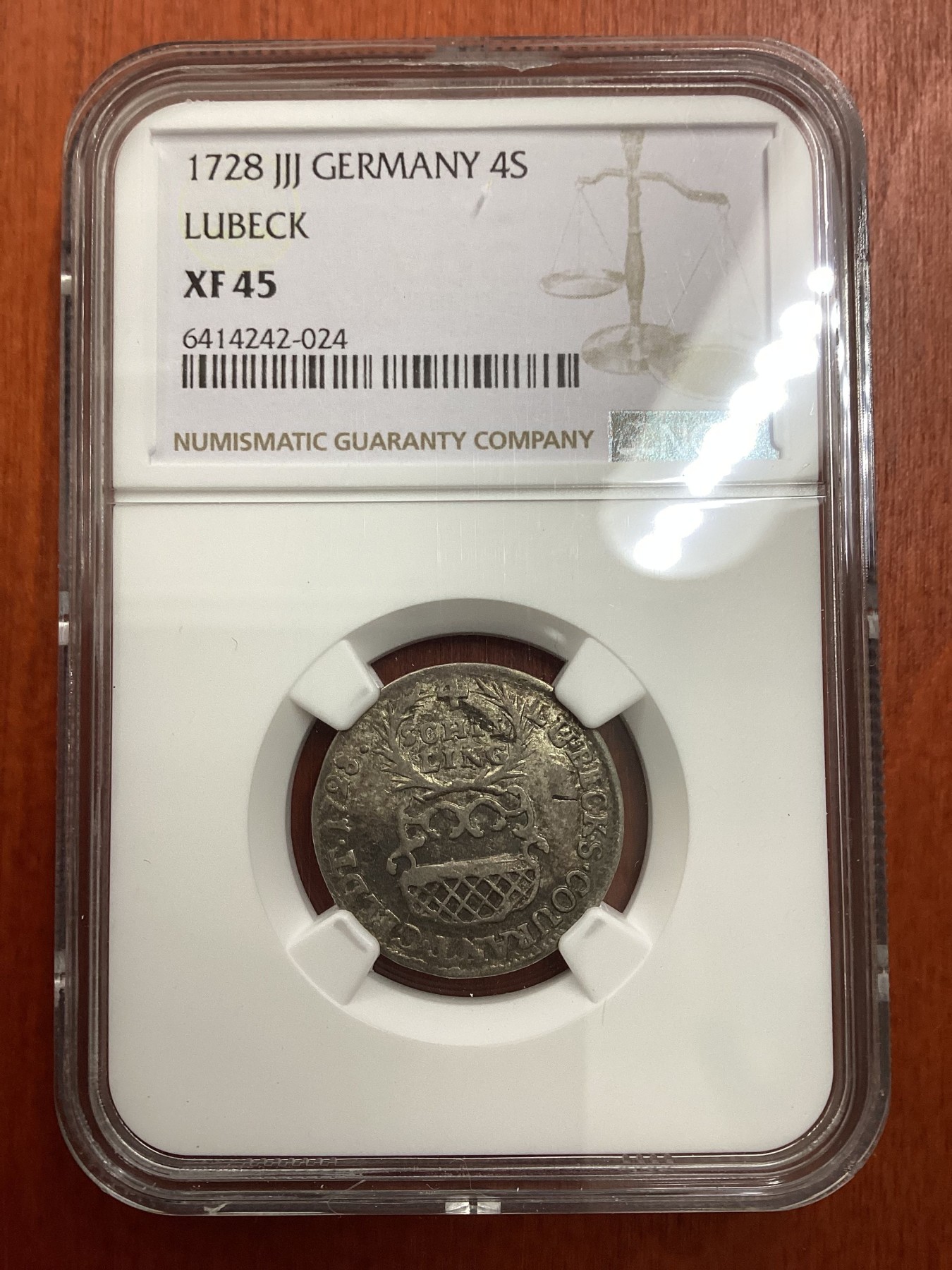 长老汇龙年精选第二场 1728 JJJ 德国吕贝克4先令银币，NGC XF45分，唯一冠军分