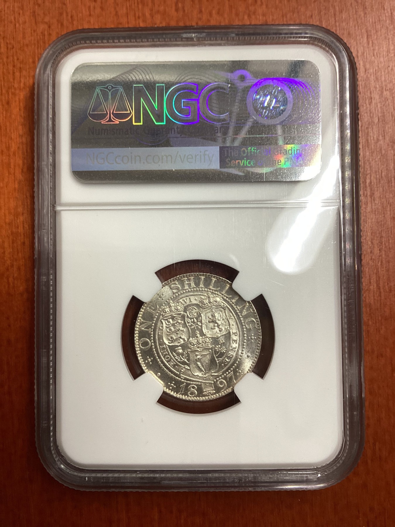 长老汇龙年精选第二场 1897 英国维多利亚1先令银币，NGC MS65分，更高分仅有10枚，无国界医生义卖标