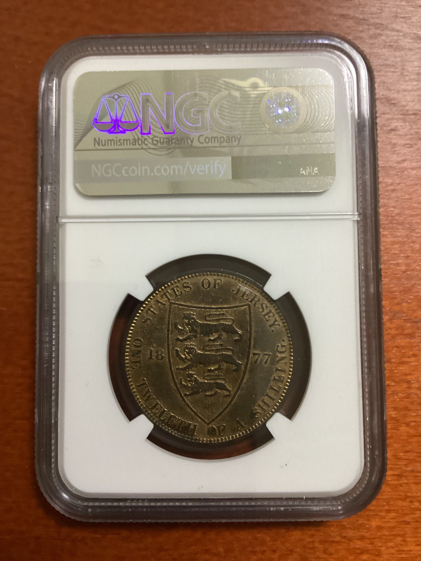 长老汇龙年精选第二场 1877H 泽西维多利亚1/12先令铜币，NGC AUC