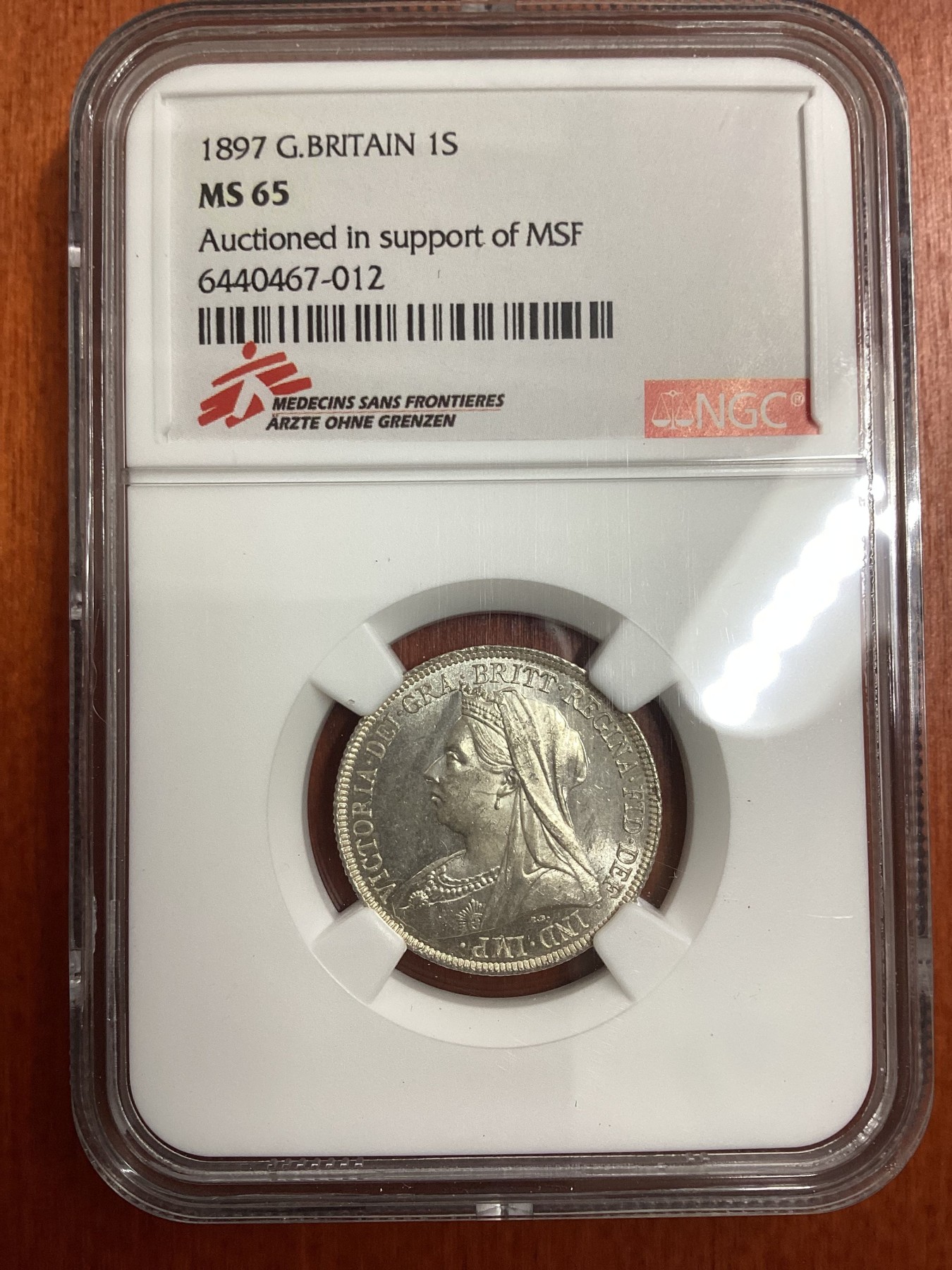 长老汇龙年精选第二场 1897 英国维多利亚1先令银币，NGC MS65分，更高分仅有10枚，无国界医生义卖标