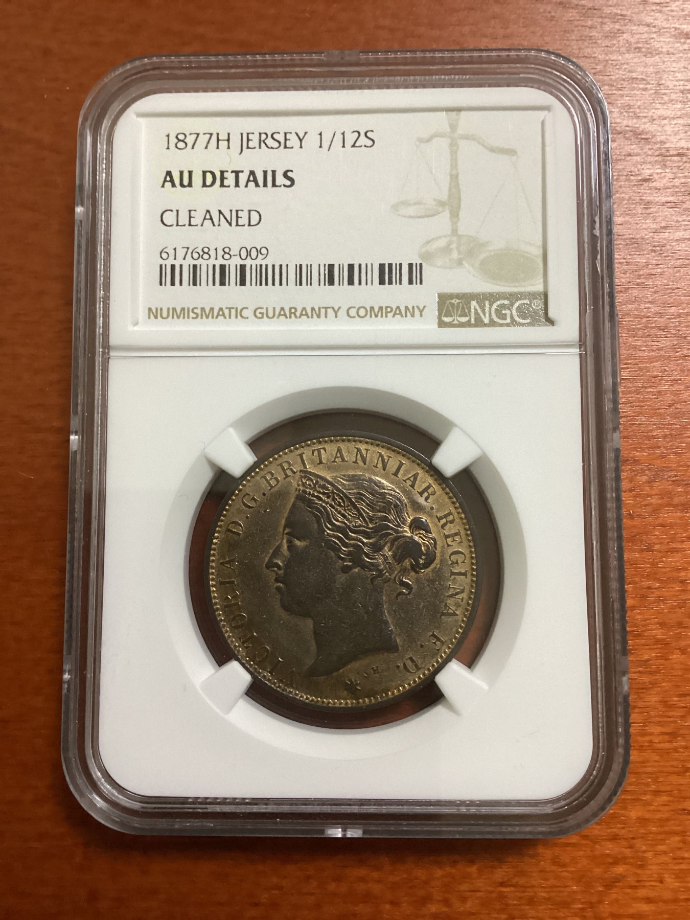 长老汇龙年精选第二场 1877H 泽西维多利亚1/12先令铜币，NGC AUC