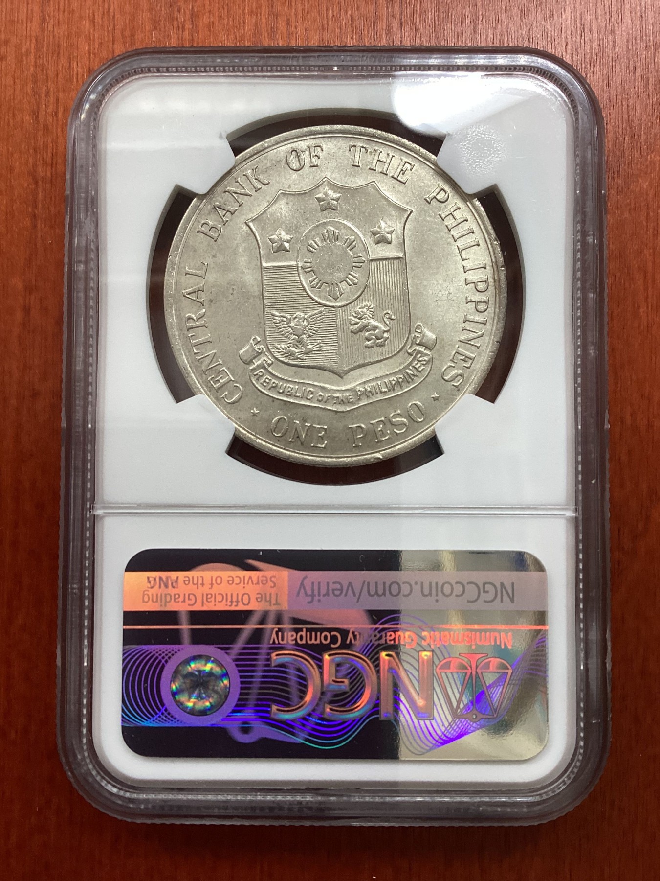 长老汇龙年精选第二场 1964菲律宾国家英雄系列马比尼1比索银币，NGC MS63分