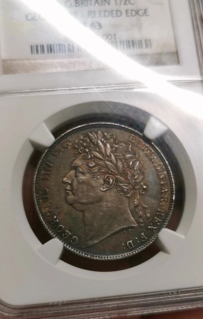 凡希社世界钱币微拍第二百六十二期 荐！1820英国乔治四世1/2克朗精铸NGC-PF63 齿边，纯正英伦五彩，实物状态完全不输前两天圣詹姆斯拍卖行5000镑落锤的P64，见附图。英系精铸精品，永远的硬通货！