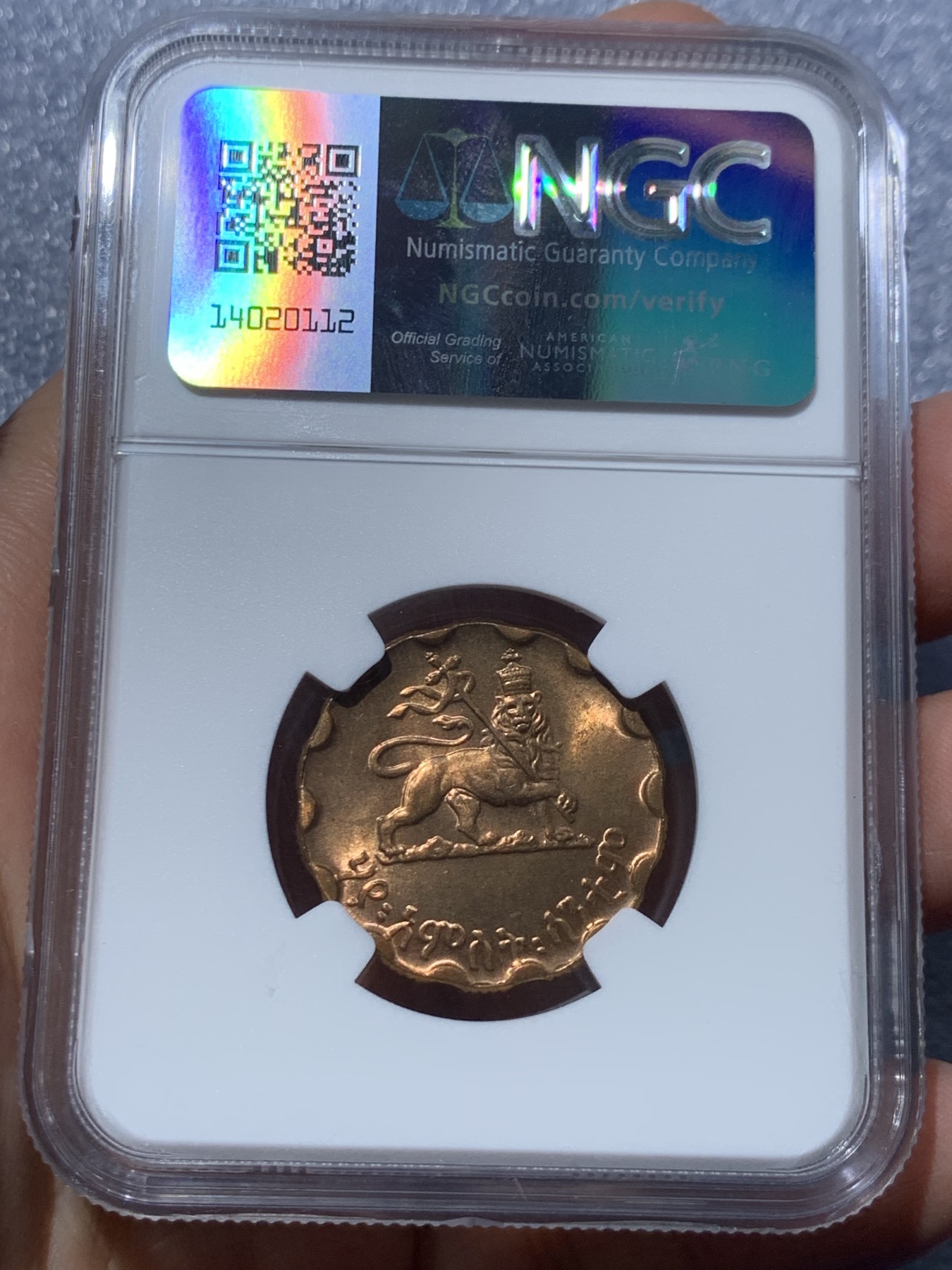 《竞宝斋》第245场-周日，周一 ，周二3场连拍 (全场包邮) NGC MS64RB 埃塞俄比亚1936年25分 经典独特的花瓣型搭配狮子扛旗 威武霸气 这个品种原铜色好品相不多的
