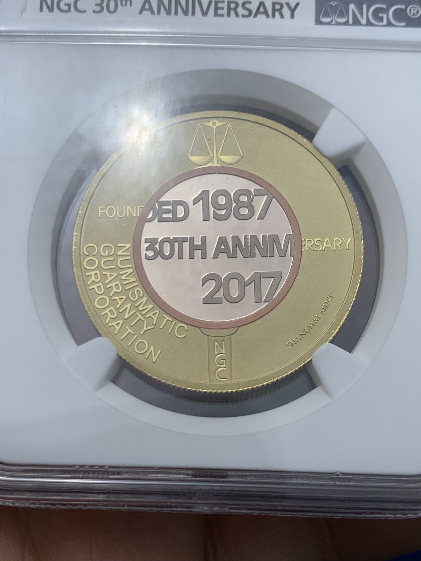 《竞宝斋》第245场-周日，周一 ，周二3场连拍 (全场包邮) NGC PF70UC 中国1987-2017NGC三十周年纪念章 背面分别是上海、香港、慕尼黑三地的景观