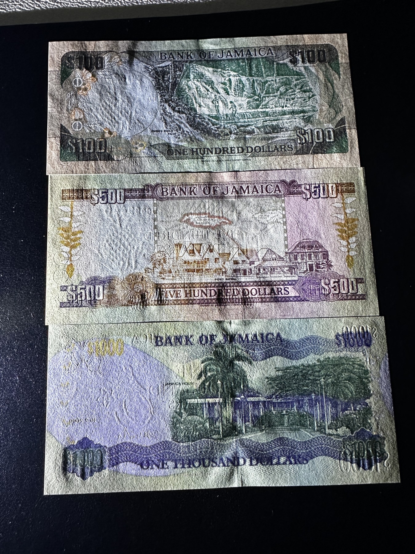 《外钞收藏家》第三百四十七期 美洲纸币专场（荷属安的列斯、福克兰群岛、阿鲁巴、墨西哥等） 牙买加1994-2000年版100/500/1000元，套币3枚全（P76-78）全新UNC