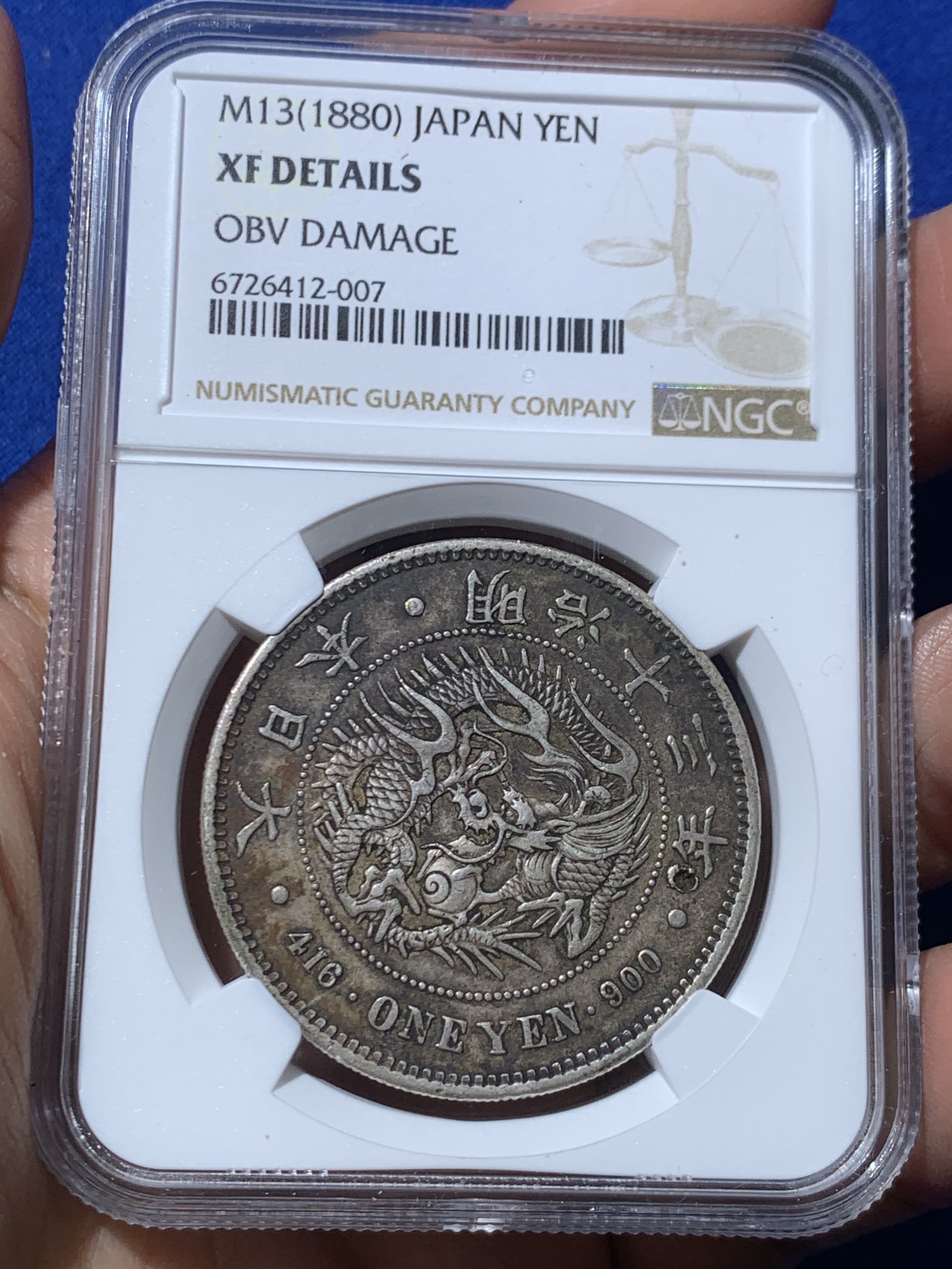 《竞宝斋》第245场-周日，周一 ，周二3场连拍 (全场包邮) NGC XFD 明治十三年1880年日本龙一枚，好年份，超级酱五彩老包浆，“年”字旁边一个小伤可惜了