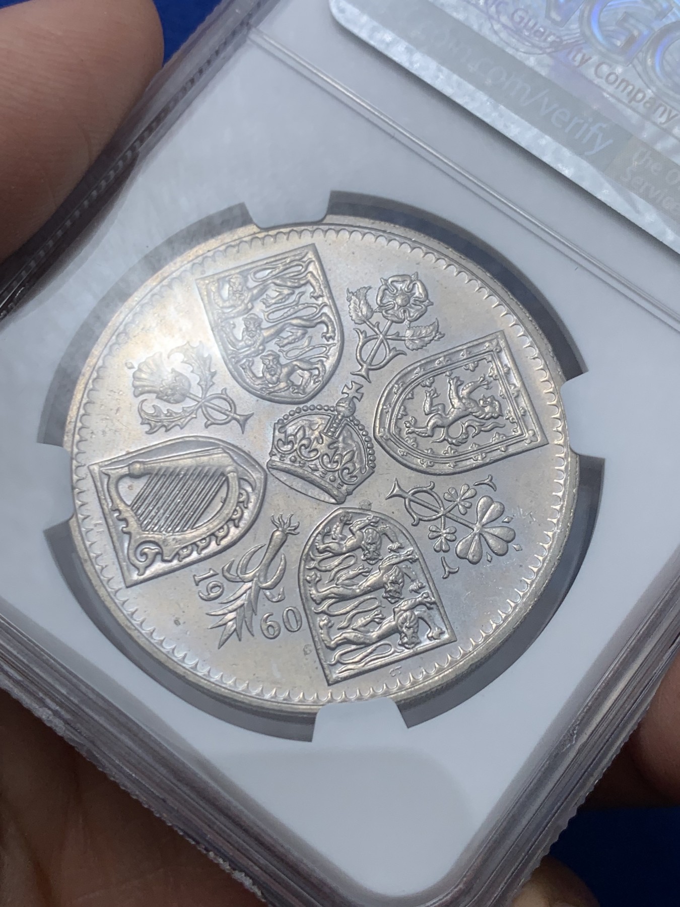 《竞宝斋》第245场-周日，周一 ，周二3场连拍 (全场包邮) NGC-PL64 英国  1960年 1克朗 大英纽约博览会纪念5先令 铜镍币 （稀少类精制版本，发行量仅7万，伊丽莎白二世女王少女头像，最后的克朗币）