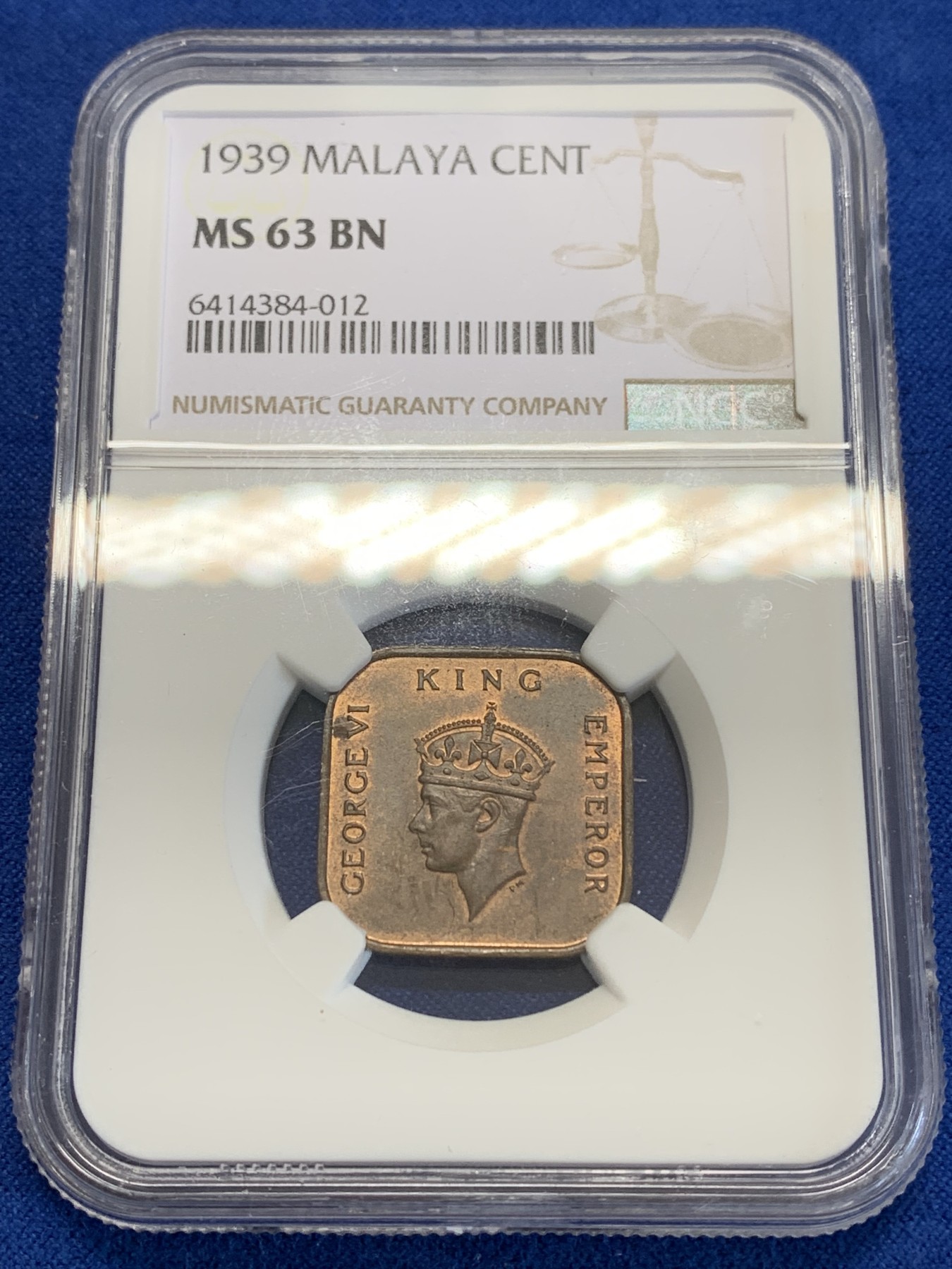 《竞宝斋》第245场-周日，周一 ，周二3场连拍 (全场包邮) NGC-MS63BN 1939年马来亚乔治六世1分方形铜币，早期大版，不是常见的后期小版。红铜光犹存，更高分仅4枚。