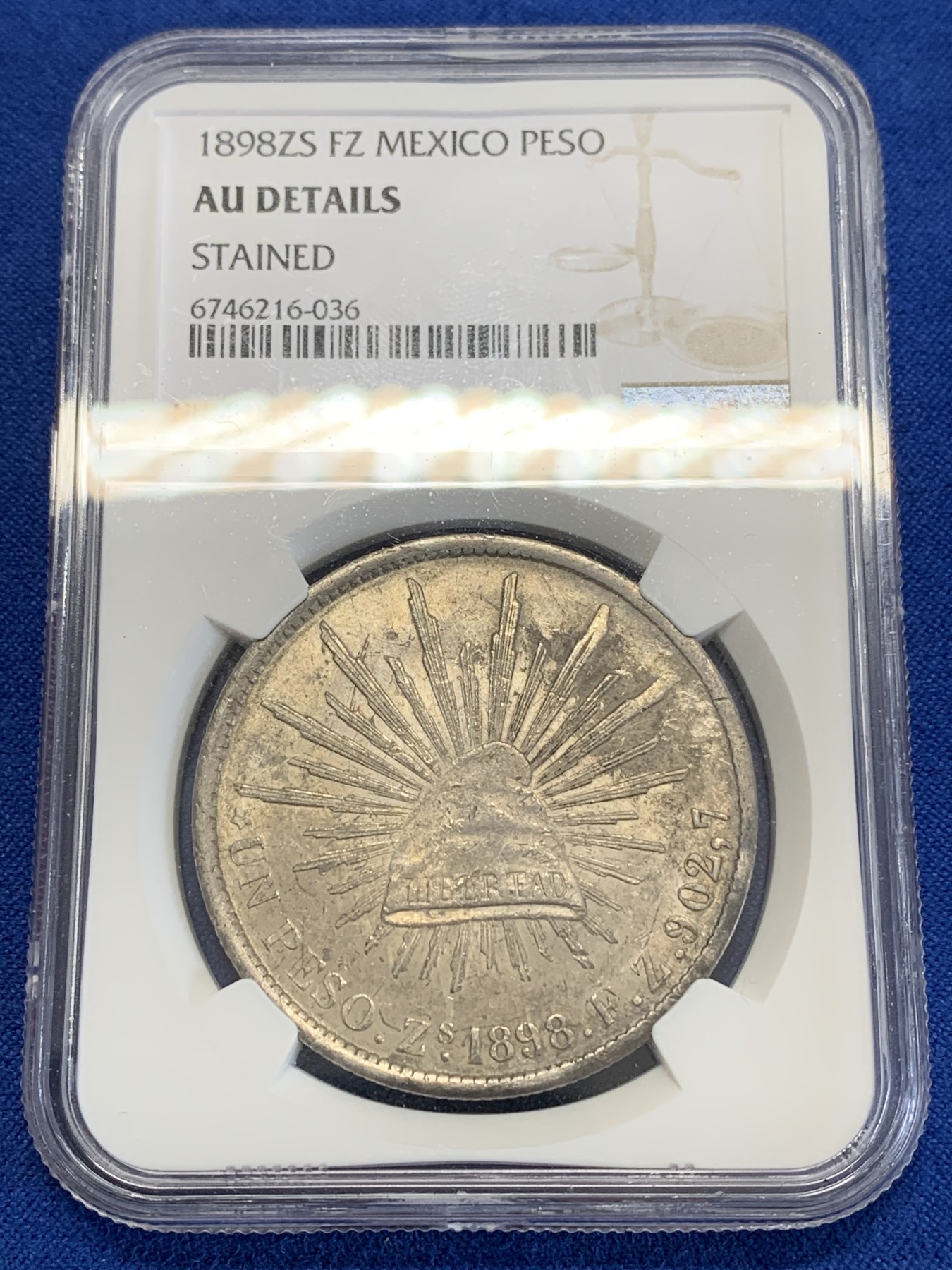 《竞宝斋》第245场-周日，周一 ，周二3场连拍 (全场包邮) NGC-AUD 墨西哥1898年ZS FZ直边鹰洋1比索银币，原汁原味老包浆，包浆醇厚，打制精美，状态极佳，经典潜力品种。