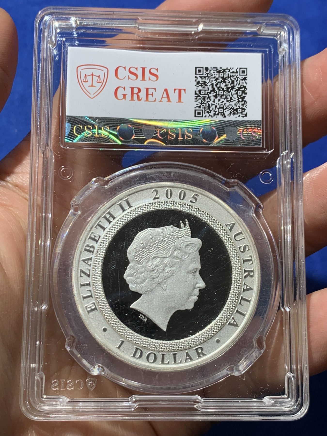 《竞宝斋》第245场-周日，周一 ，周二3场连拍 (全场包邮) CSIS-GREAT PF70 UC 澳大利亚2005年二战胜利跳舞的男人炫变银币-1澳元精制币（克劳斯获奖2007年最佳创意及最佳时事银币） 40mm 1盎司 999银 发行量25000枚