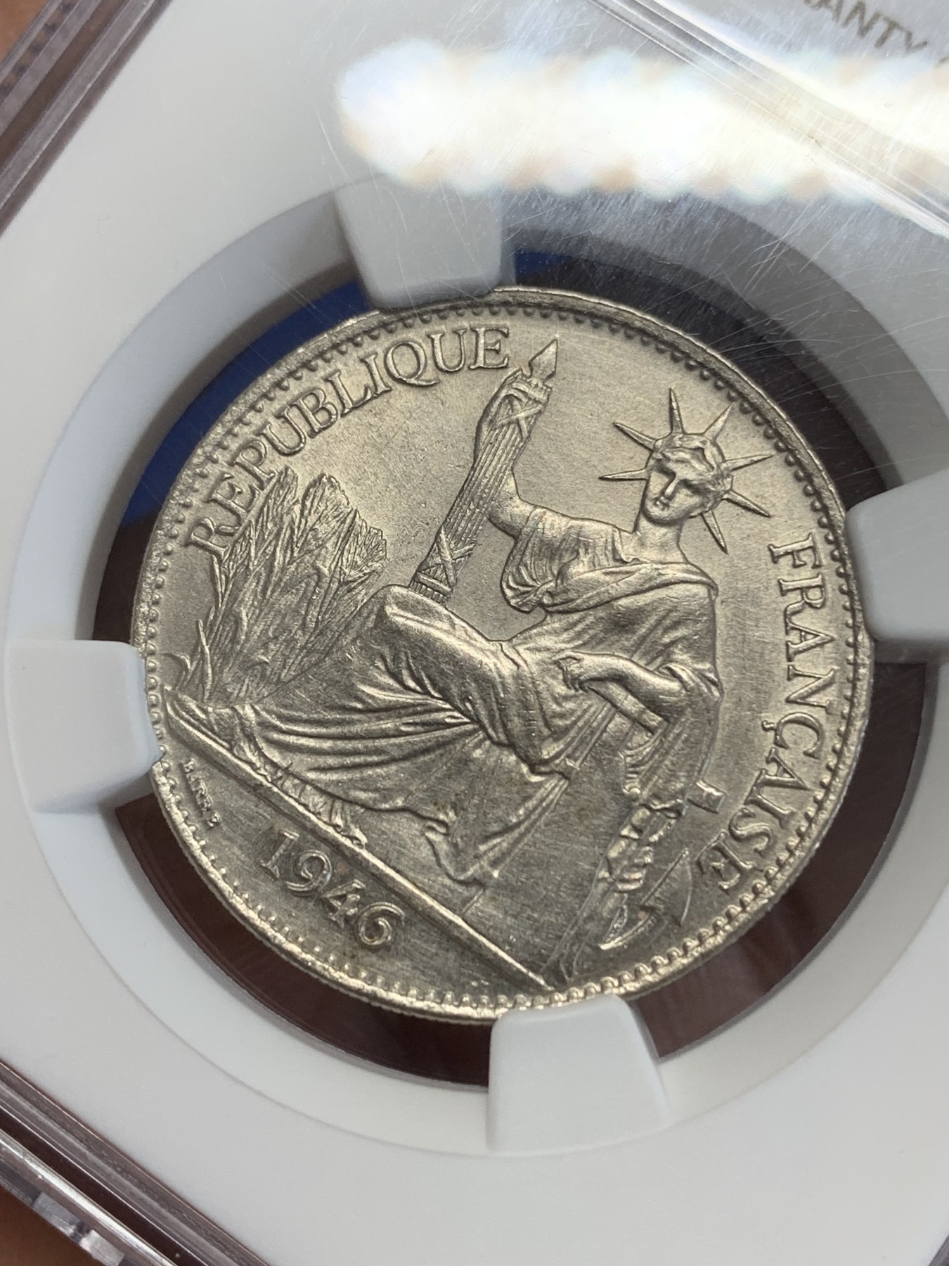 《竞宝斋》第246场-周日，周一 ，周二3场连拍 (全场包邮) NGC-UNCD 法属印支1946年坐洋50分镍币，细节非常好。