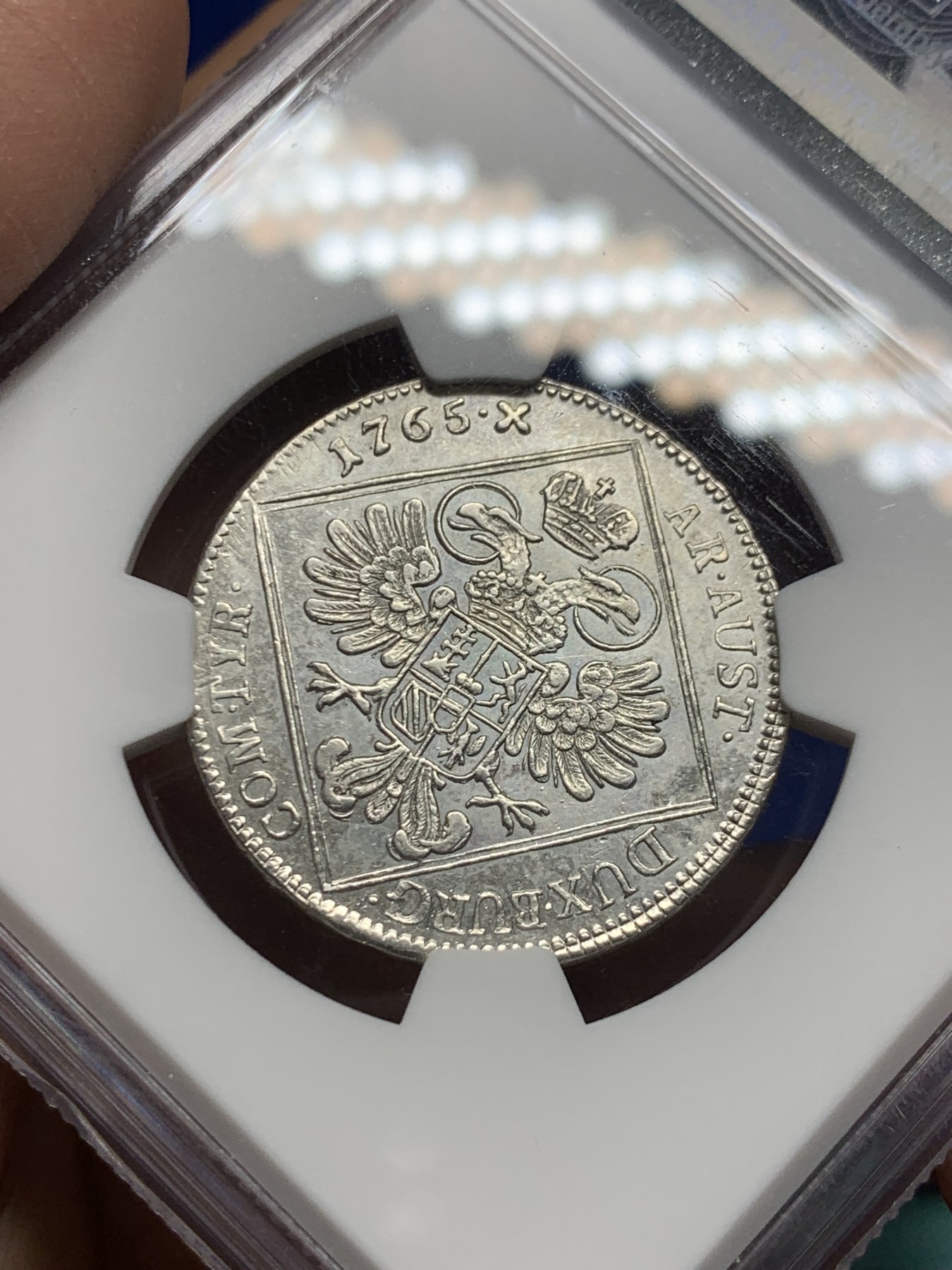 《竞宝斋》第246场-周日，周一 ，周二3场连拍 (全场包邮) NGC-AU55 唯一冠军分 1765年神罗原铸大奶妈30K银币，维也纳厂。原铸大奶妈，非常少见的品种，xf品官网参考价145美元，数据库唯一冠军。