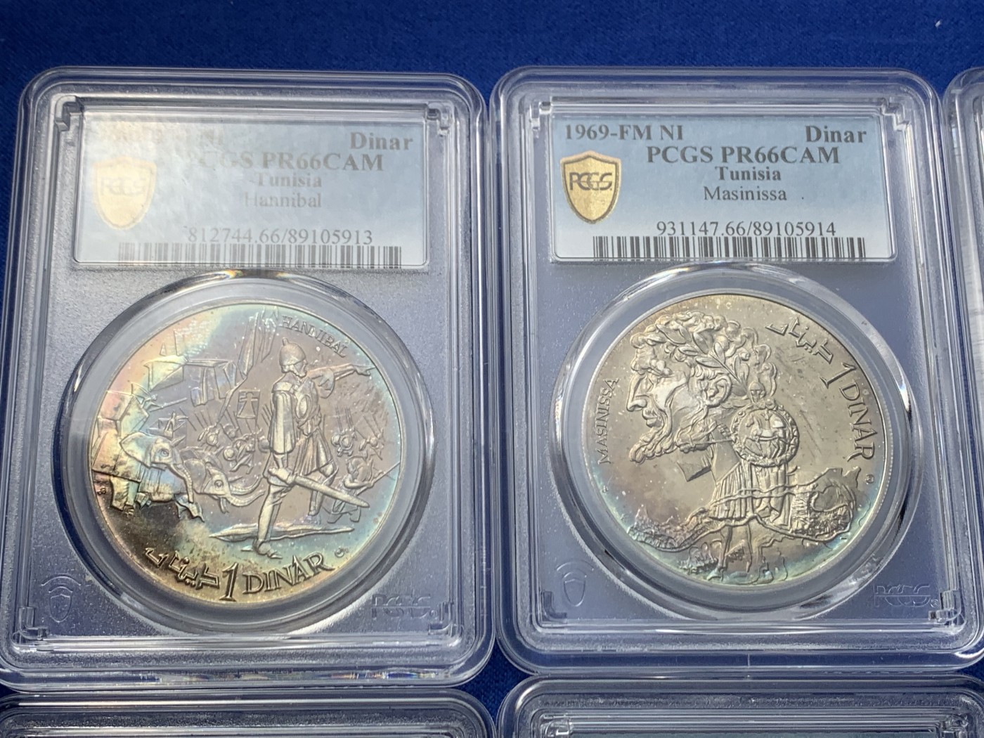 《竞宝斋》第246场-周日，周一 ，周二3场连拍 (全场包邮) 10枚一组 突尼斯1969年古代文明10枚精制大银币全套，国外运回国原样送评，8枚入盒，2枚pvc，整体五彩包浆比较厚，导致分数偏低，币面无明显擦痕，不想折腾了，感兴趣的可以养护下再送，有惊喜。