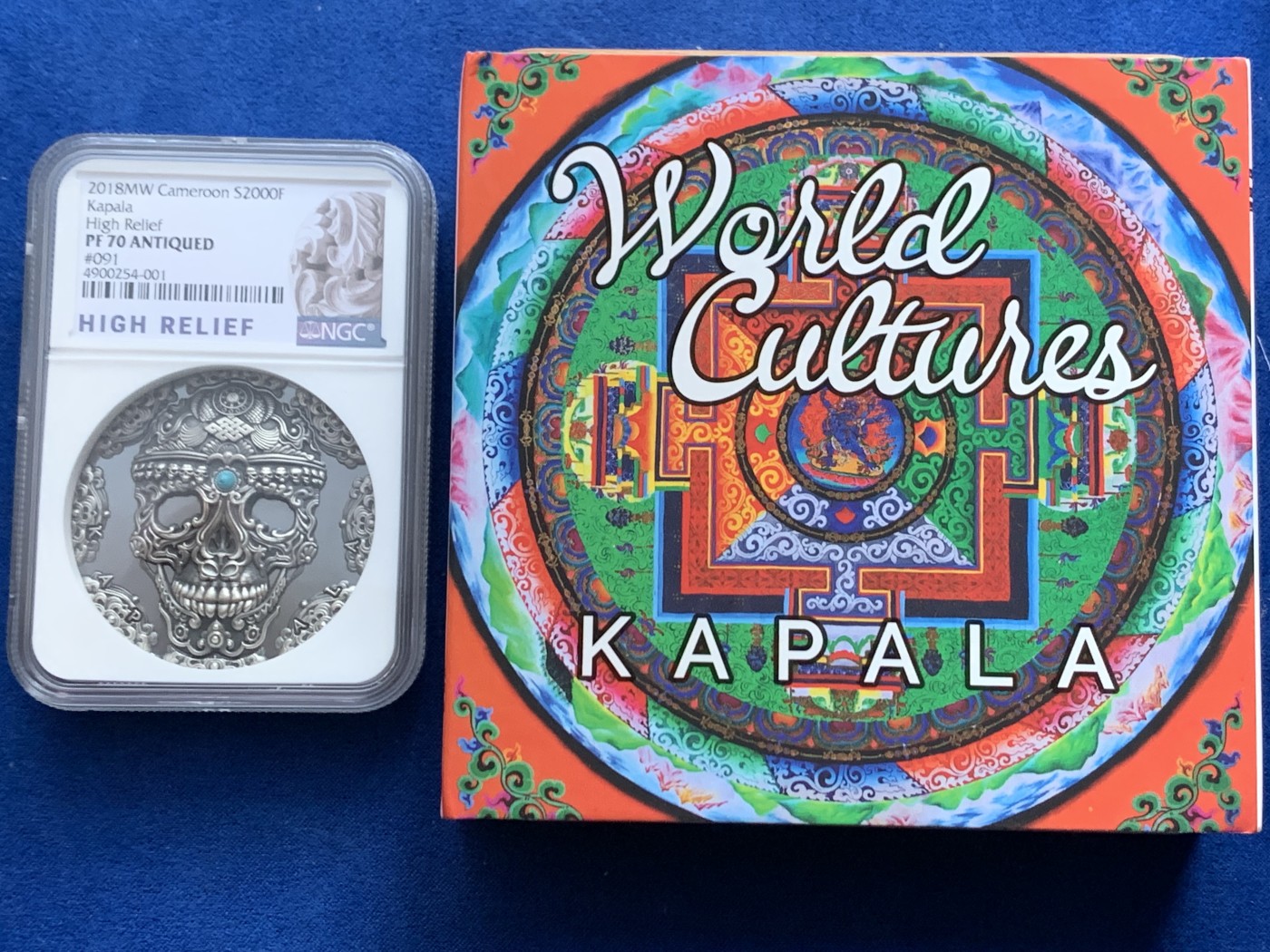 《竞宝斋》第246场-周日，周一 ，周二3场连拍 (全场包邮) NGC PF70 喀麦隆2018卡帕拉头盖镶嵌绿松石 2盎司 银币 091 高浮雕标 盒证齐全 镶嵌工艺 世界文化系列首枚 状态极好