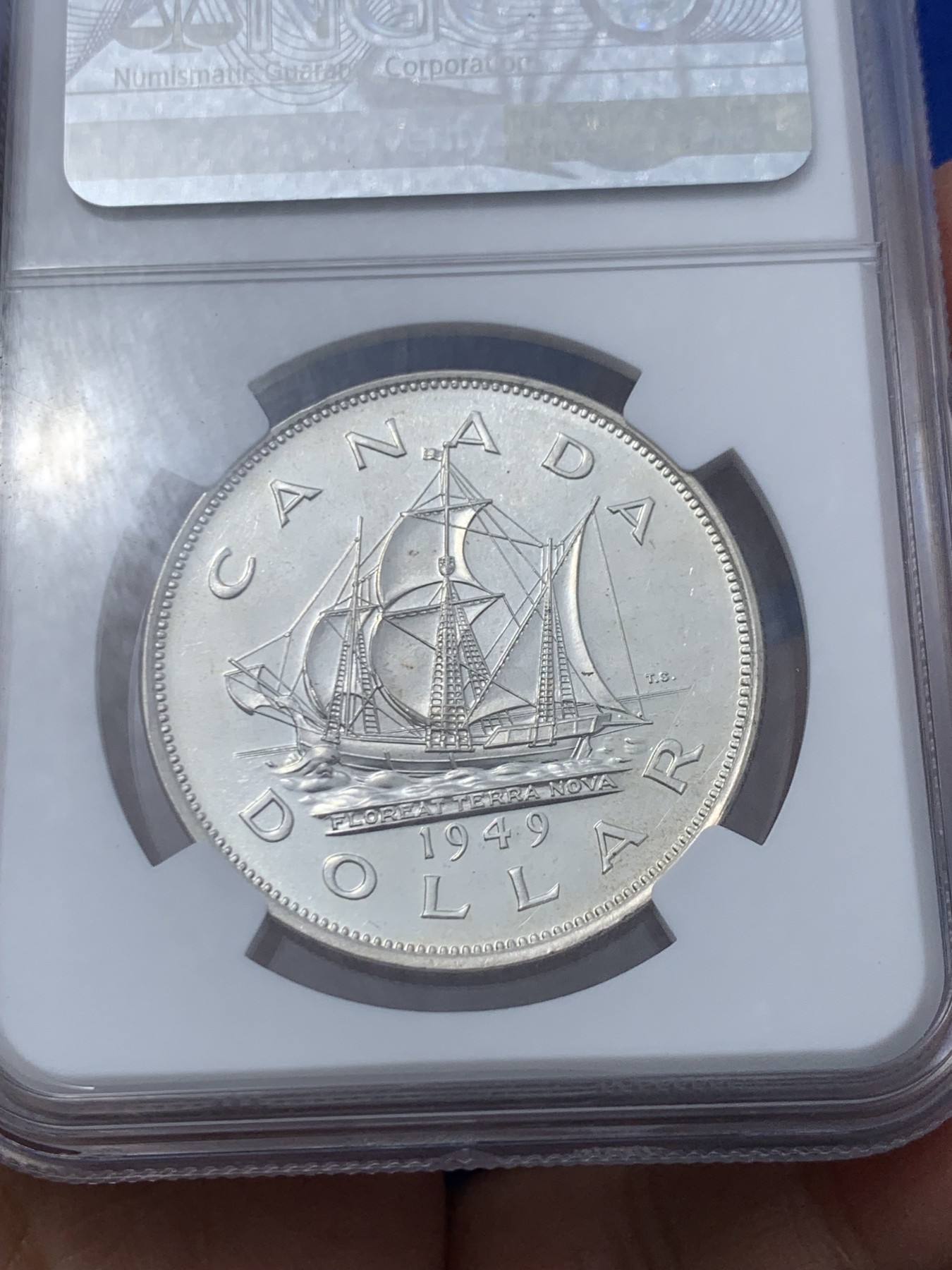 《竞宝斋》第246场-周日，周一 ，周二3场连拍 (全场包邮) NGC-MS65 加拿大1949年乔治六世帆船壹圆大银币，底板pl感十足，丝滑车轮光，无暇状态，老号段严评。