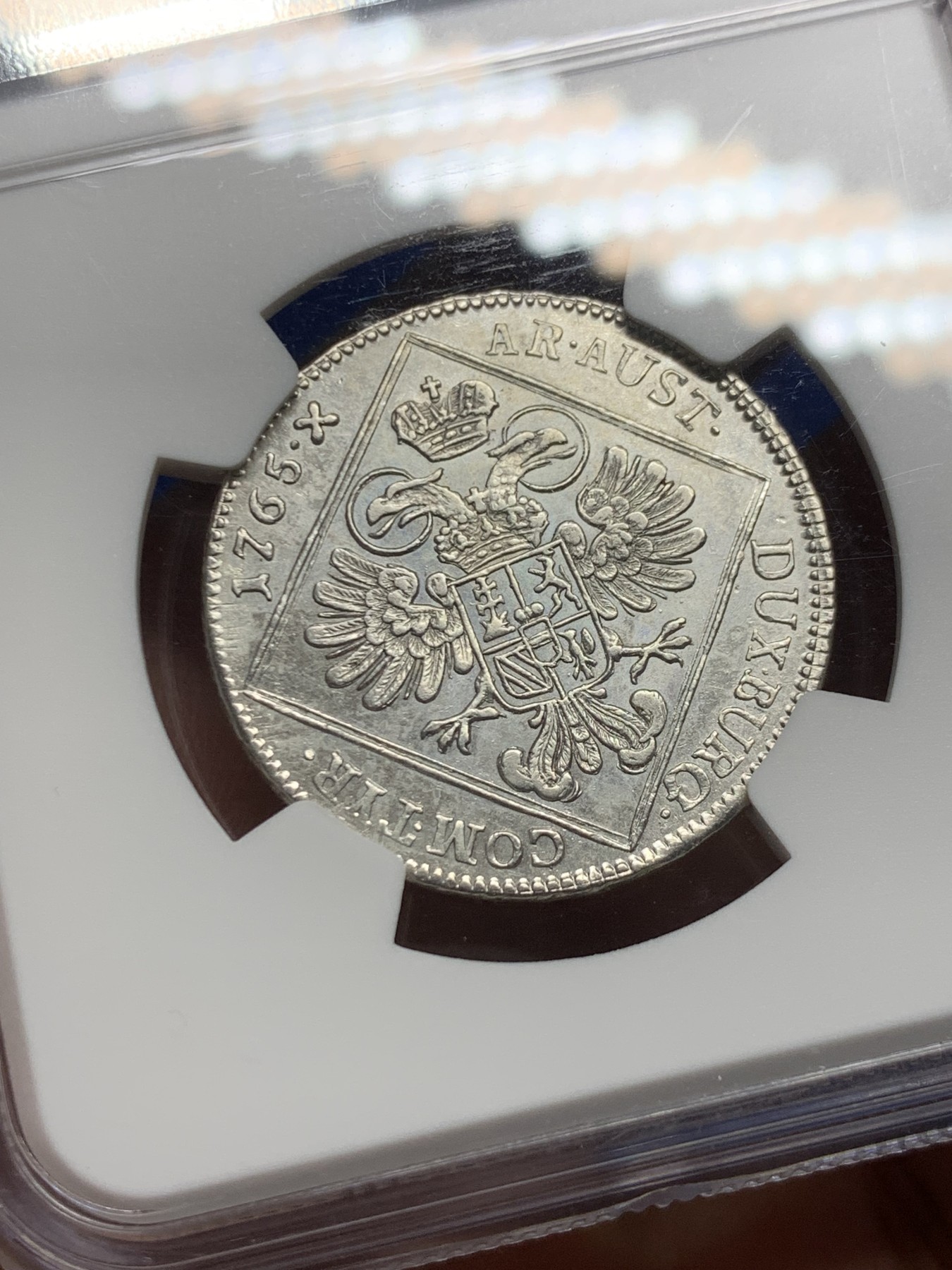 《竞宝斋》第246场-周日，周一 ，周二3场连拍 (全场包邮) NGC-AU55 唯一冠军分 1765年神罗原铸大奶妈30K银币，维也纳厂。原铸大奶妈，非常少见的品种，xf品官网参考价145美元，数据库唯一冠军。