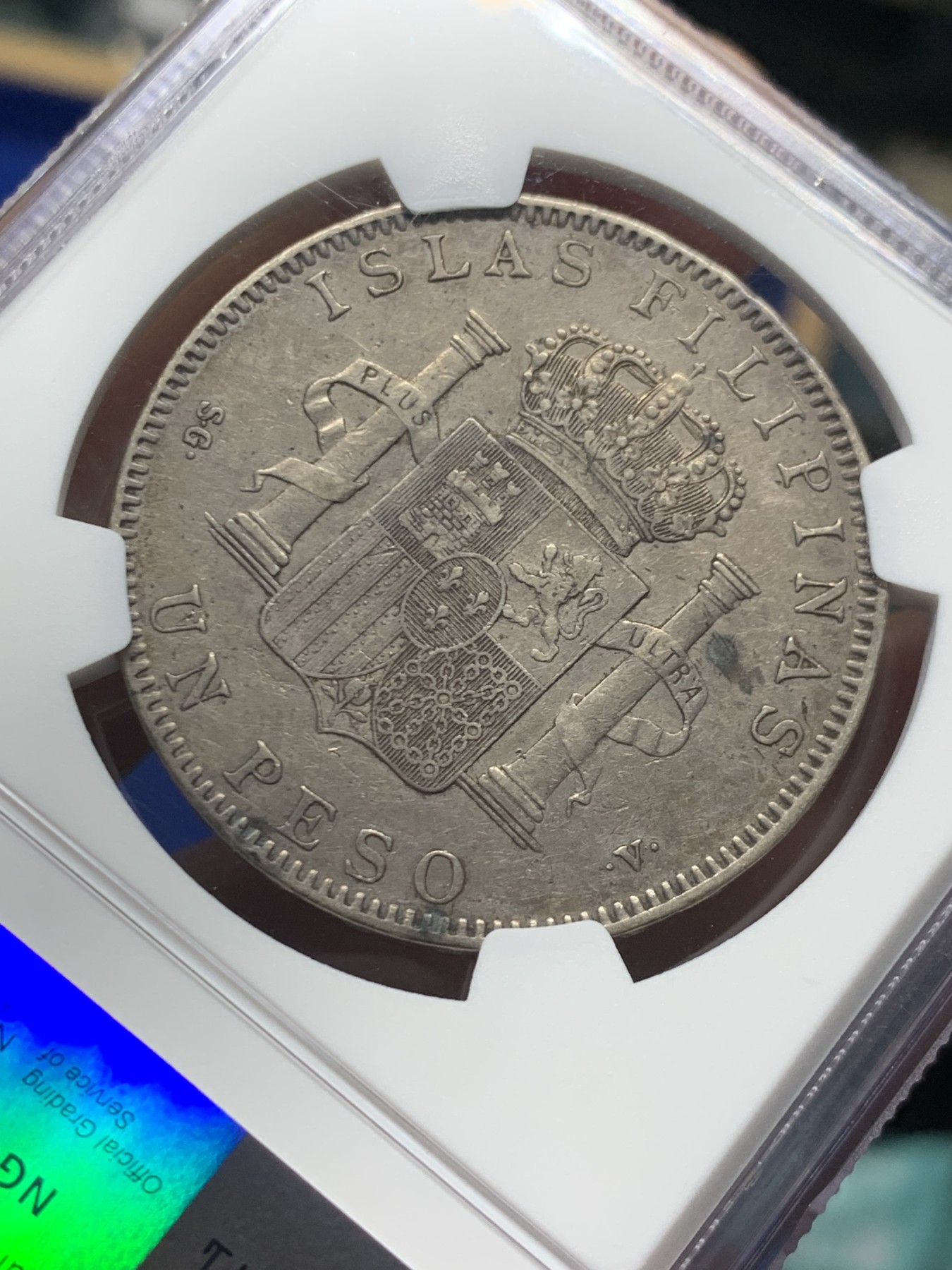 《竞宝斋》第246场-周日，周一 ，周二3场连拍 (全场包邮) NGC XF45 1897年西属菲律宾1比索 五彩包浆，仅发行一年的西属菲律宾唯一大银，HA上成交价300多美元