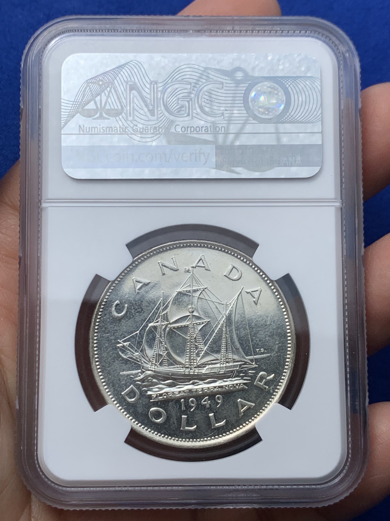 《竞宝斋》第246场-周日，周一 ，周二3场连拍 (全场包邮) NGC-MS65 加拿大1949年乔治六世帆船壹圆大银币，底板pl感十足，丝滑车轮光，无暇状态，老号段严评。