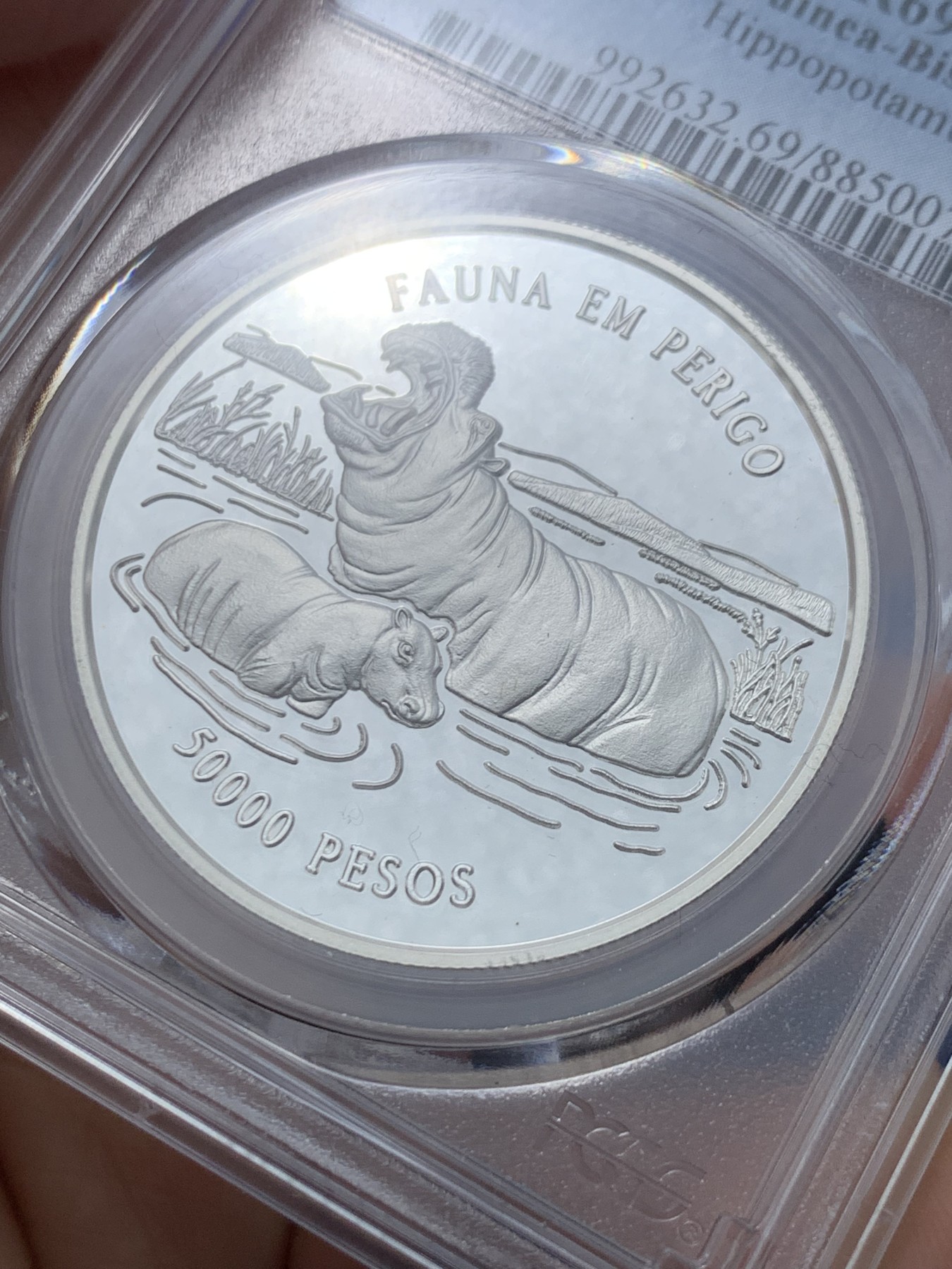 《竞宝斋》第246场-周日，周一 ，周二3场连拍 (全场包邮) PCGS金盾 PR69DCAM 几内亚比绍1996年河马5万比索精制大银币，冠军分，925银，直径38.5mm，重量31.47g