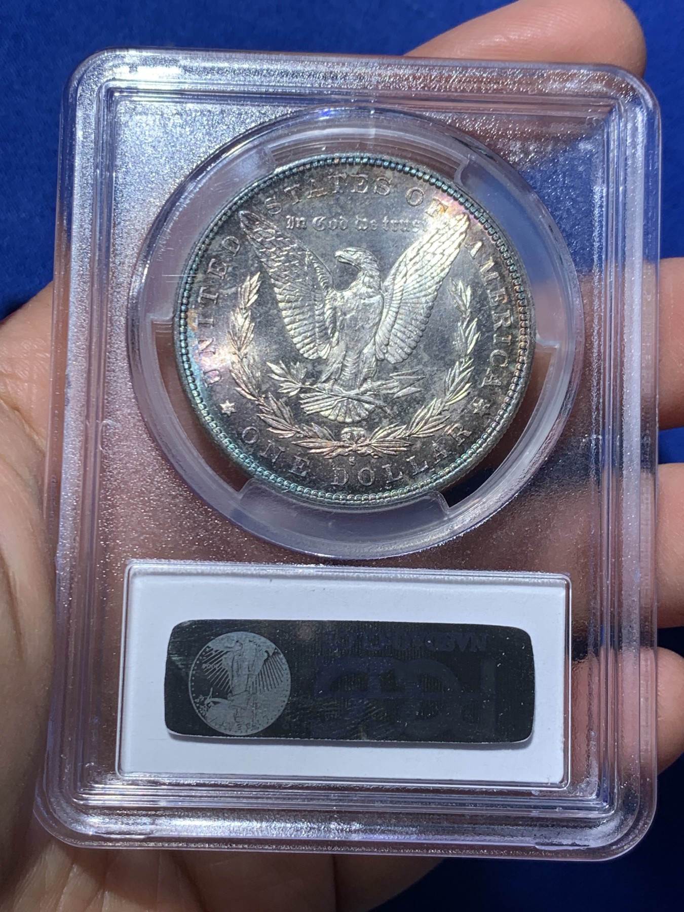 《竞宝斋》第246场-周日，周一 ，周二3场连拍 (全场包邮) NGC-MS64 美国1882年摩根银币S版，原汁原味五彩老包浆，包浆醇厚，打制精美，市场上比较稀少年份版本的摩根币，PC早期老盒严评无官网图。