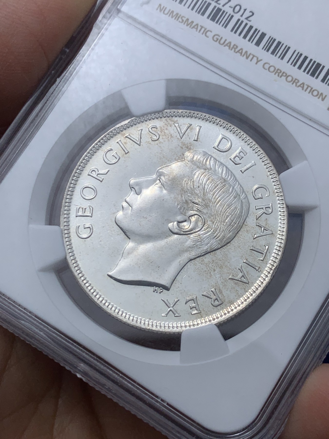 《竞宝斋》第246场-周日，周一 ，周二3场连拍 (全场包邮) NGC-MS65 加拿大1949年乔治六世帆船壹圆大银币，底板pl感十足，丝滑车轮光，无暇状态，老号段严评。