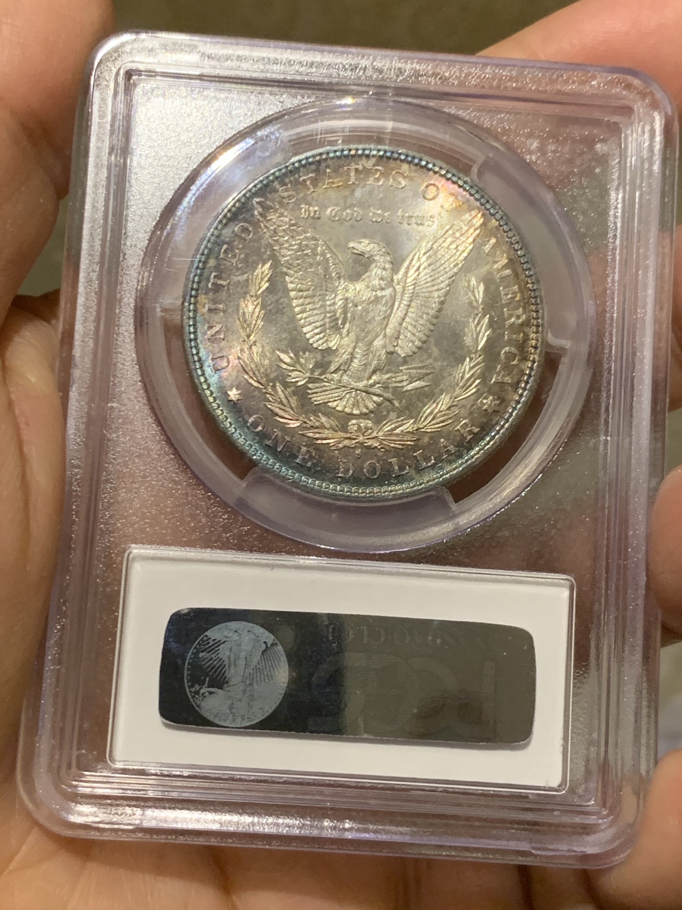 《竞宝斋》第246场-周日，周一 ，周二3场连拍 (全场包邮) NGC-MS64 美国1882年摩根银币S版，原汁原味五彩老包浆，包浆醇厚，打制精美，市场上比较稀少年份版本的摩根币，PC早期老盒严评无官网图。