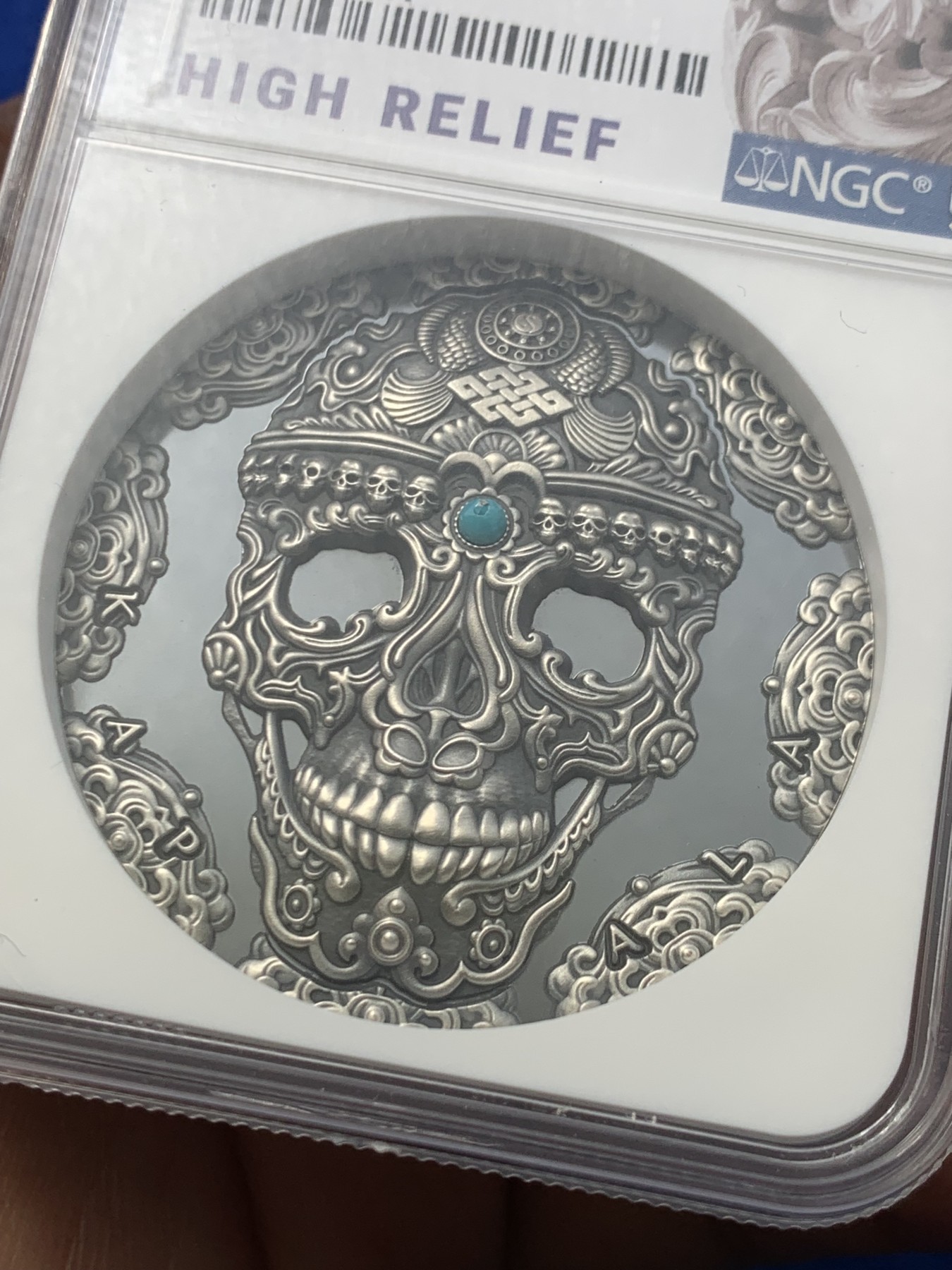 《竞宝斋》第246场-周日，周一 ，周二3场连拍 (全场包邮) NGC PF70 喀麦隆2018卡帕拉头盖镶嵌绿松石 2盎司 银币 091 高浮雕标 盒证齐全 镶嵌工艺 世界文化系列首枚 状态极好