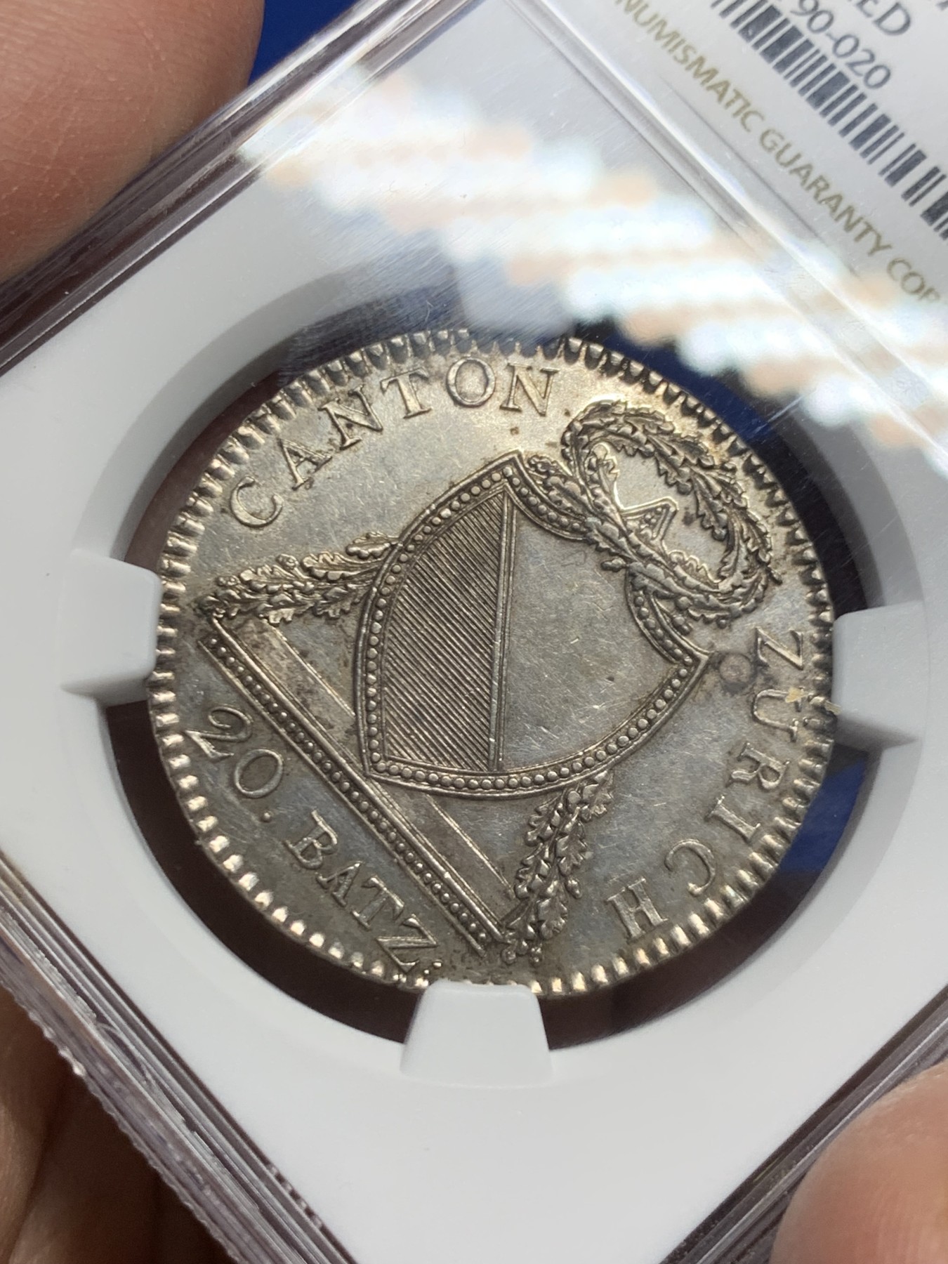 《竞宝斋》第246场-周日，周一 ，周二3场连拍 (全场包邮) NGC UNC 瑞士1813-B苏黎世20巴增银币 黑五彩 单一发行年份 十分稀缺的品种 克书价高