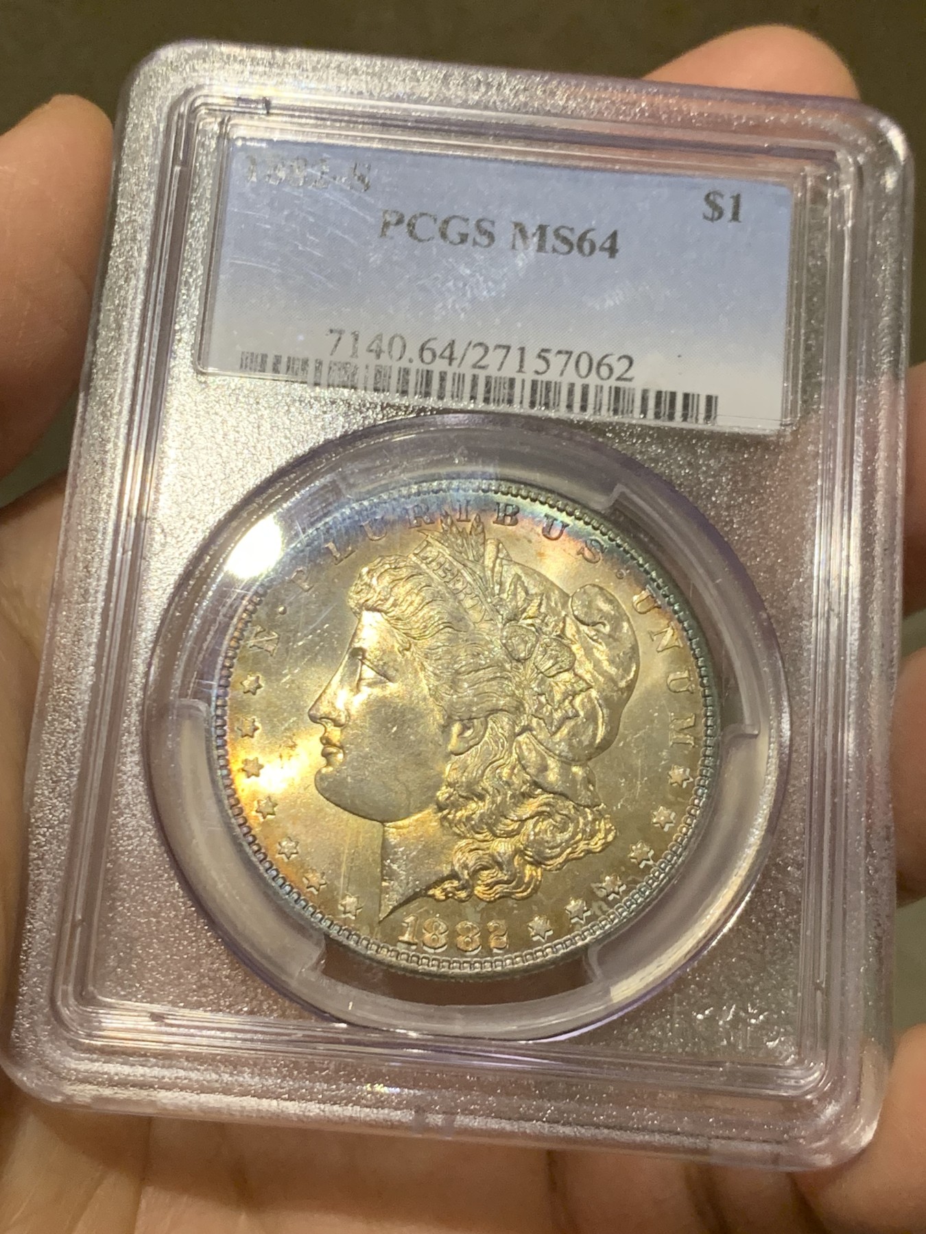 《竞宝斋》第246场-周日，周一 ，周二3场连拍 (全场包邮) NGC-MS64 美国1882年摩根银币S版，原汁原味五彩老包浆，包浆醇厚，打制精美，市场上比较稀少年份版本的摩根币，PC早期老盒严评无官网图。