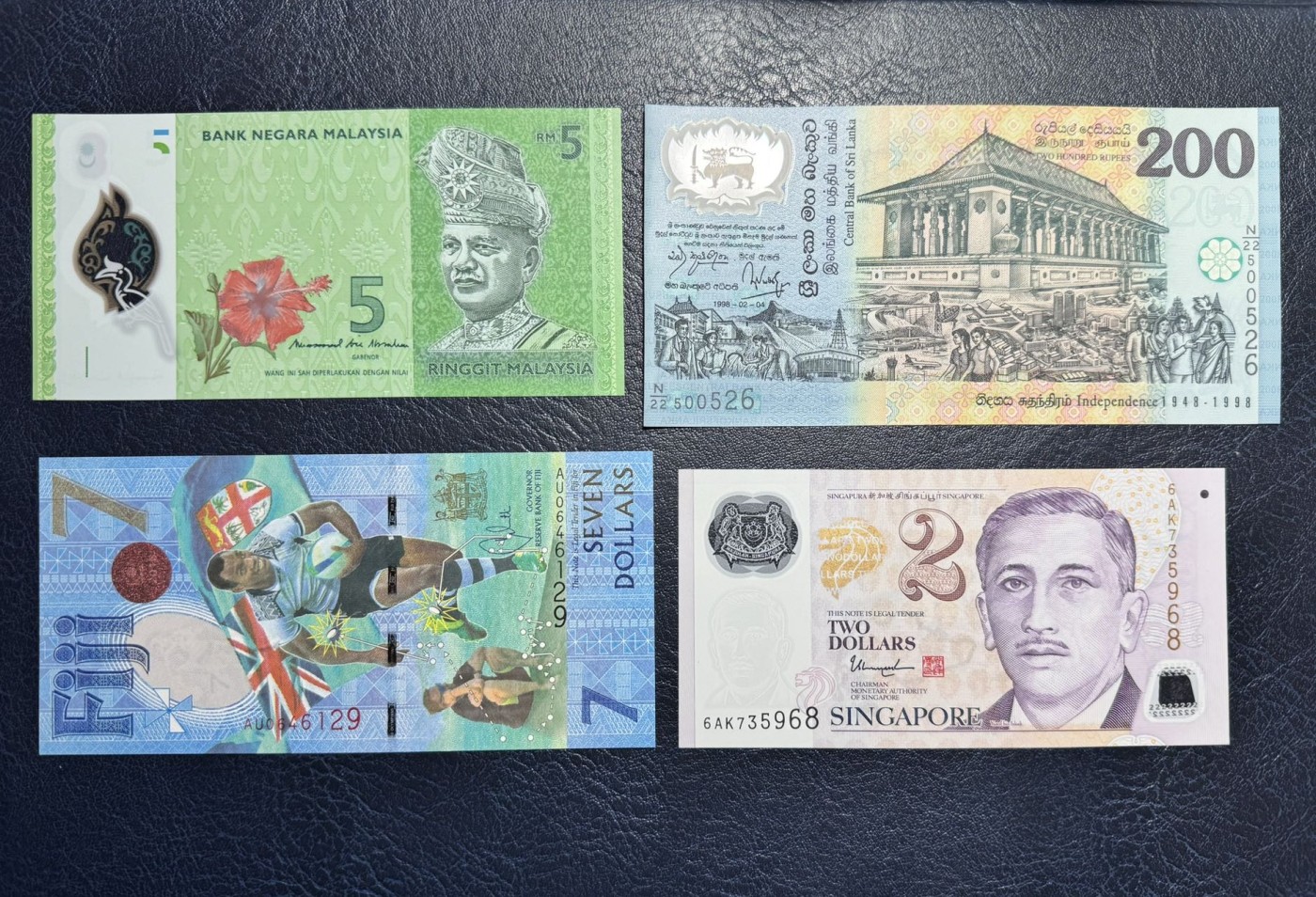 收藏联盟Quantum Auction 第330期拍卖  斯里兰卡，泰国，新加坡，斐济，日本等纸币12张 品相全新UNC 泰国一张轻微点钞痕