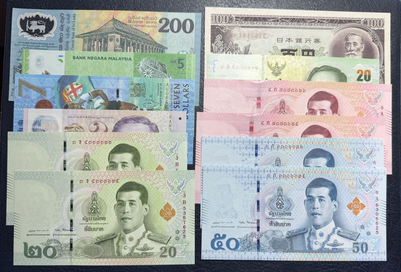 收藏联盟Quantum Auction 第330期拍卖  斯里兰卡，泰国，新加坡，斐济，日本等纸币12张 品相全新UNC 泰国一张轻微点钞痕