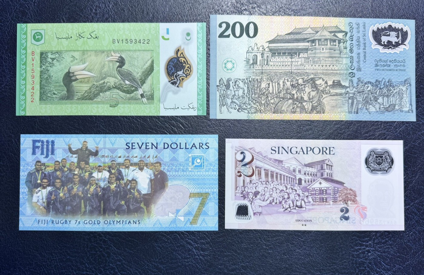 收藏联盟Quantum Auction 第330期拍卖  斯里兰卡，泰国，新加坡，斐济，日本等纸币12张 品相全新UNC 泰国一张轻微点钞痕