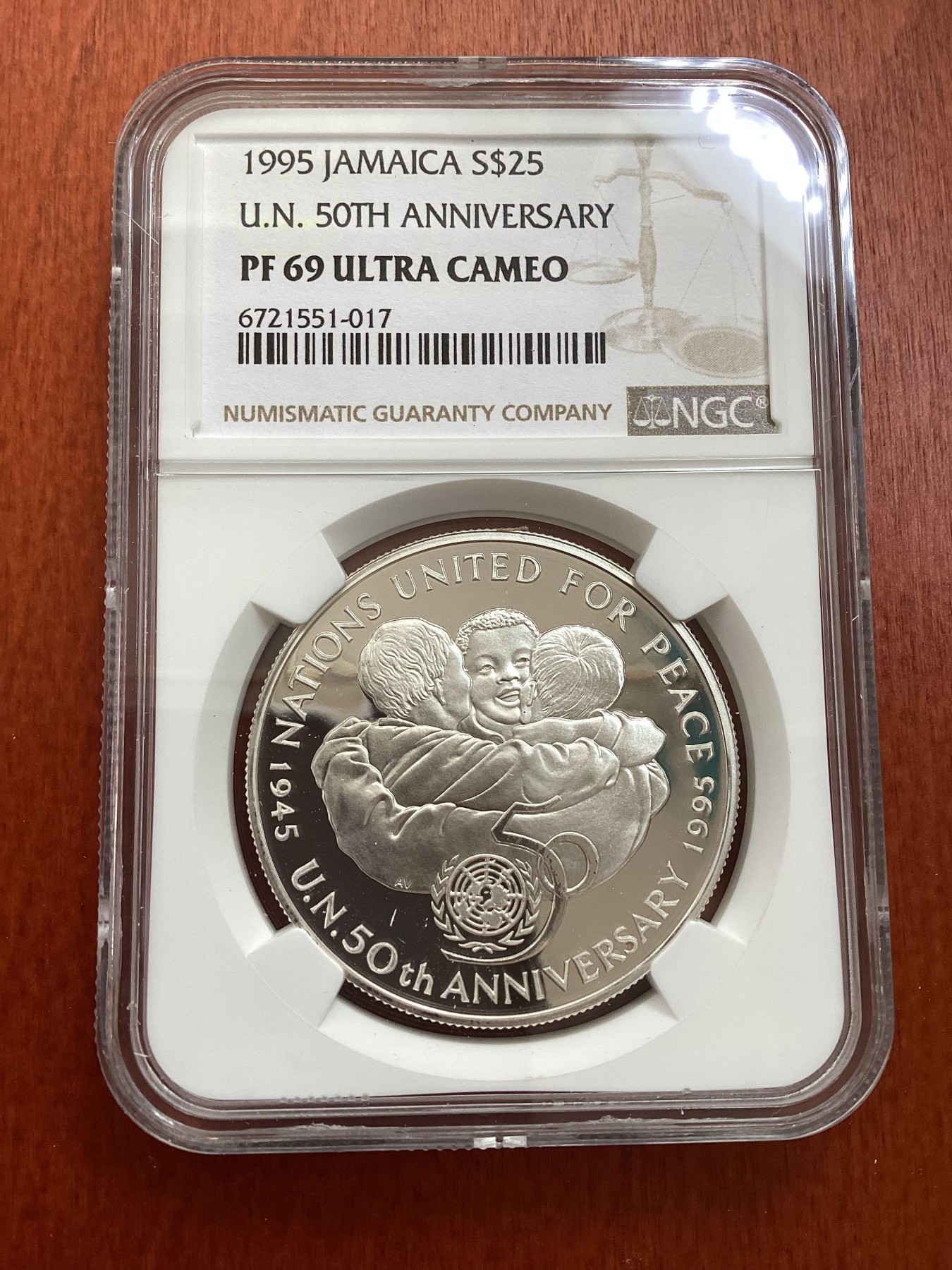长老汇龙年精选第三场 1995牙买加联合国成立50周年25元精制银币， NGC PF69UC，更高分仅有三枚