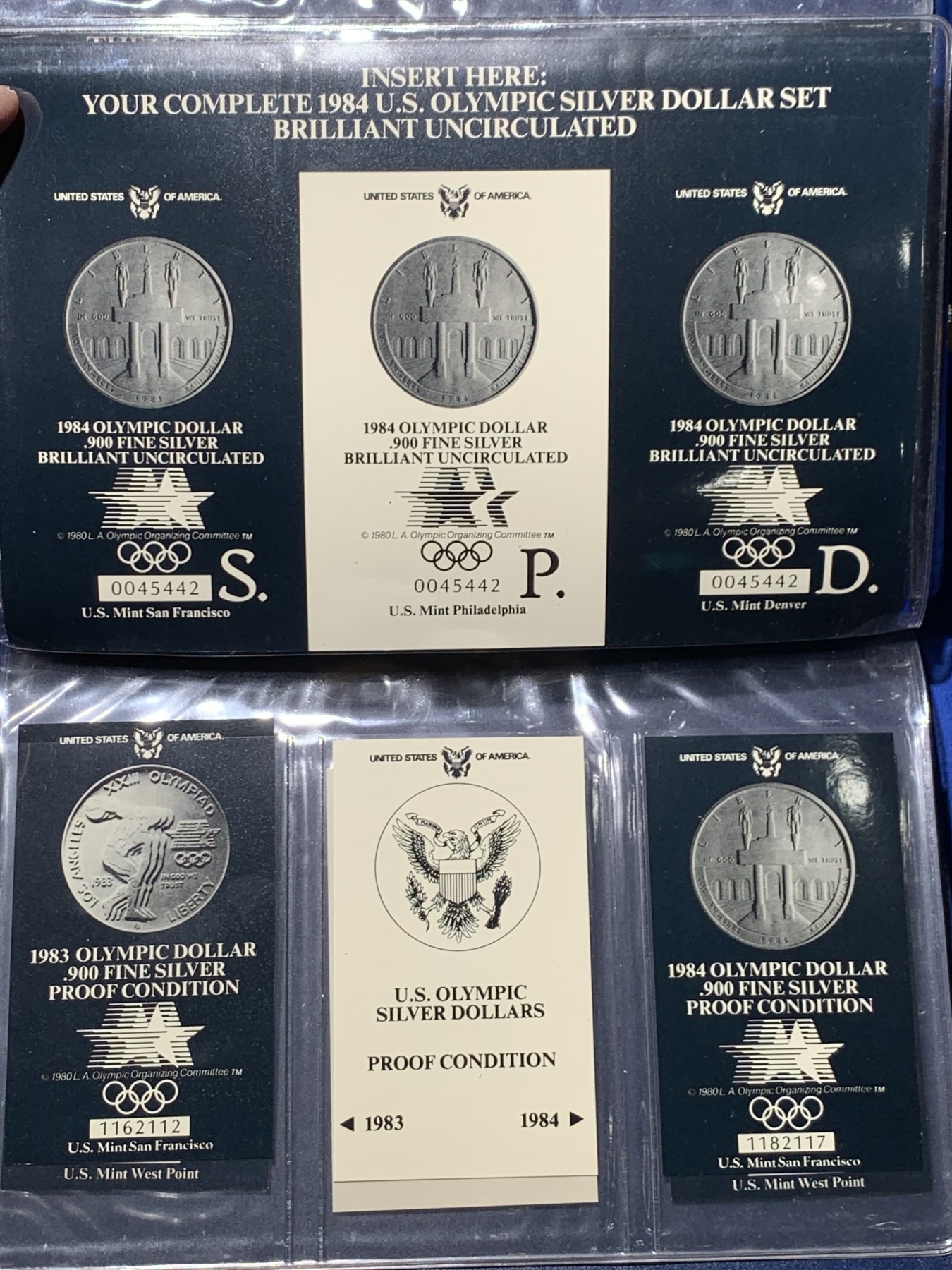 《竞宝斋》第247场-周日，周一 ，周二3场连拍 (全场包邮) 3枚一组 美国奥运册 1983年 老鹰1美元大银币 不同造币厂三枚一起 卡册带空位可放其它品种