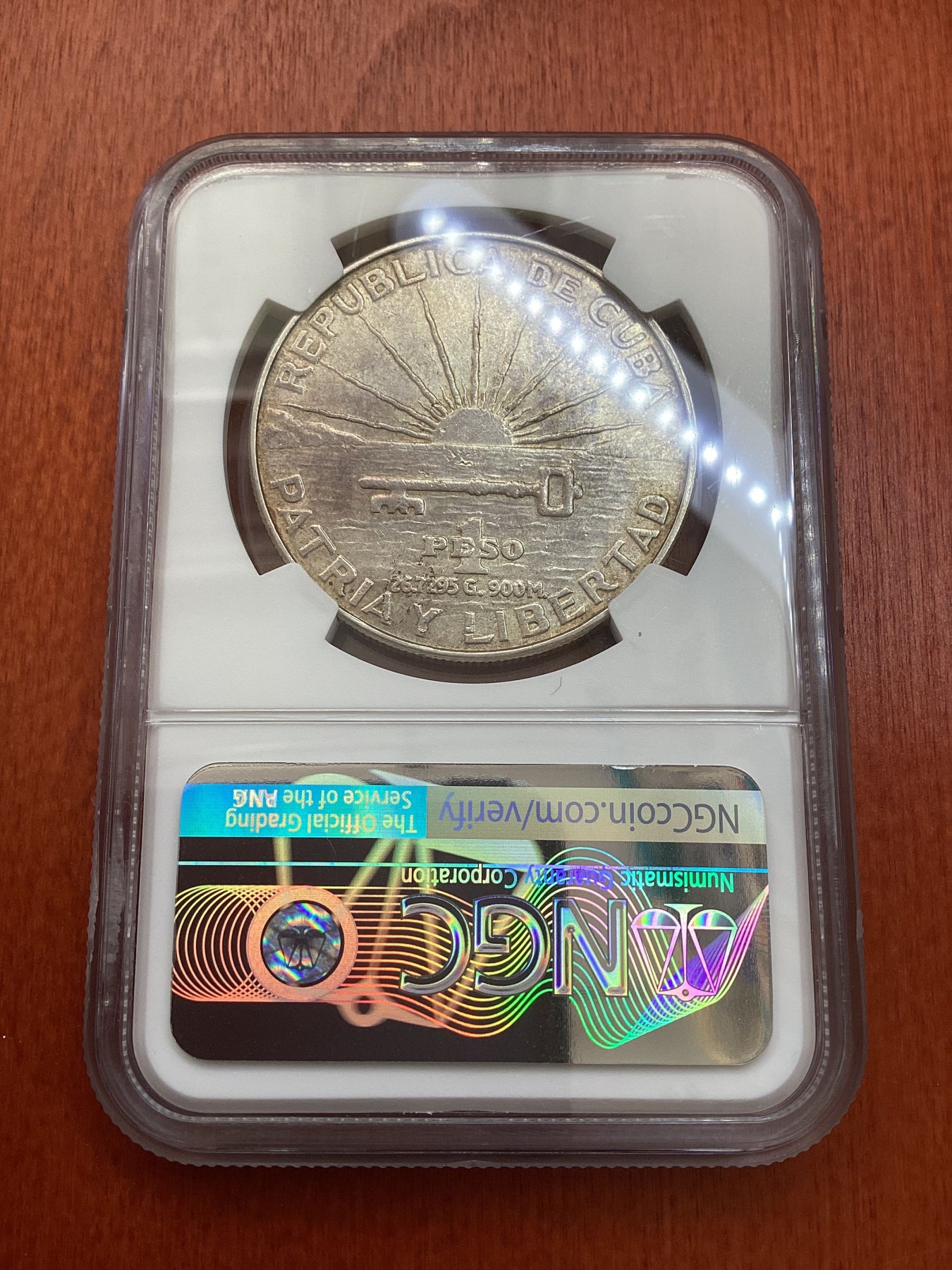 长老汇龙年精选第三场 1953 古巴何塞·马丁百周年1比索大银币，NGC AU58分