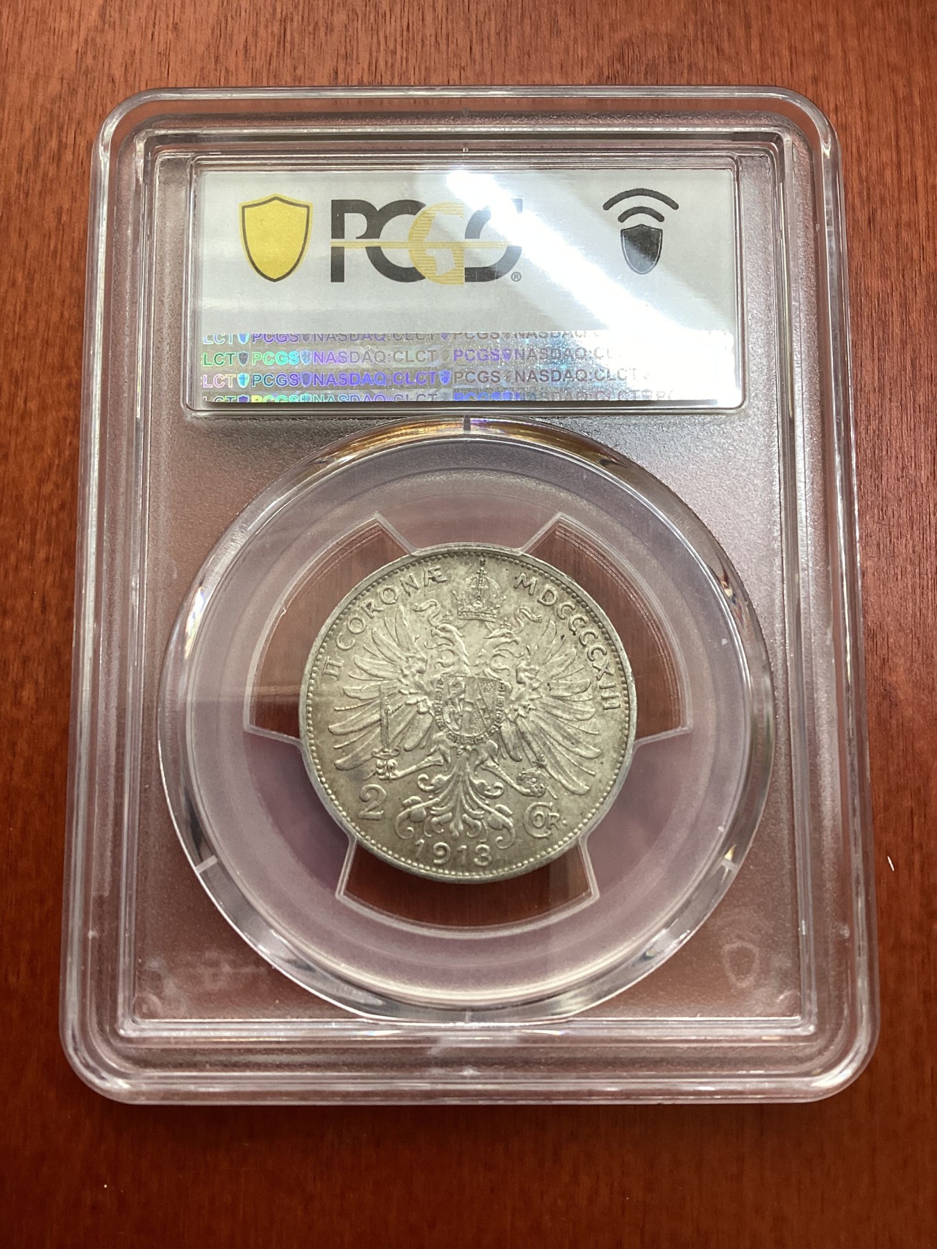 长老汇龙年精选第三场 1913 奥地利约瑟夫一世2 科罗纳银币，PCGS AU58分，状态好于分数，P盒中该币58分到62分之间没有任何评级币