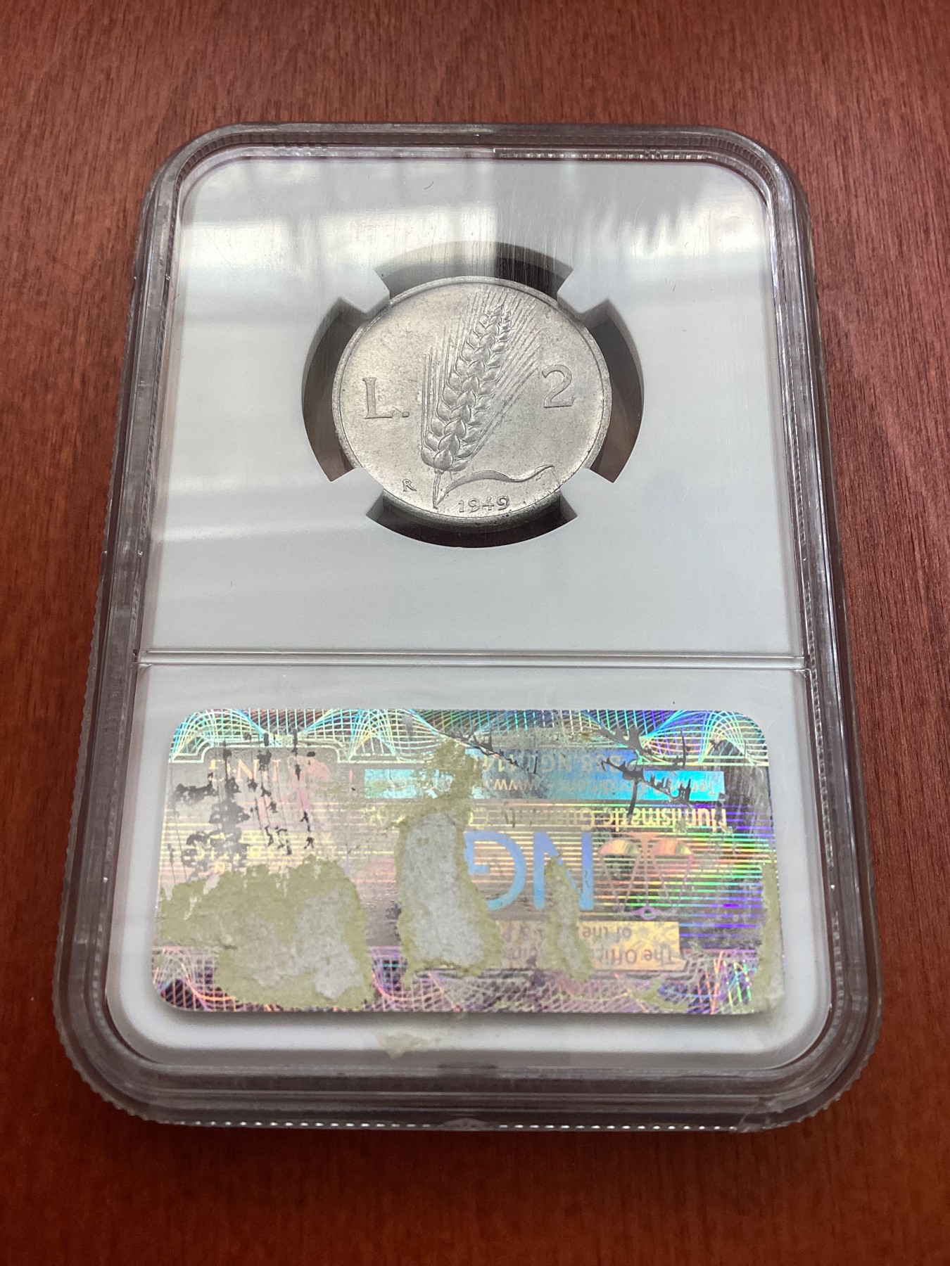 长老汇龙年精选第三场 1949R 意大利2里拉，NGC MS62分，三枚季军分之一，更高分仅有两枚