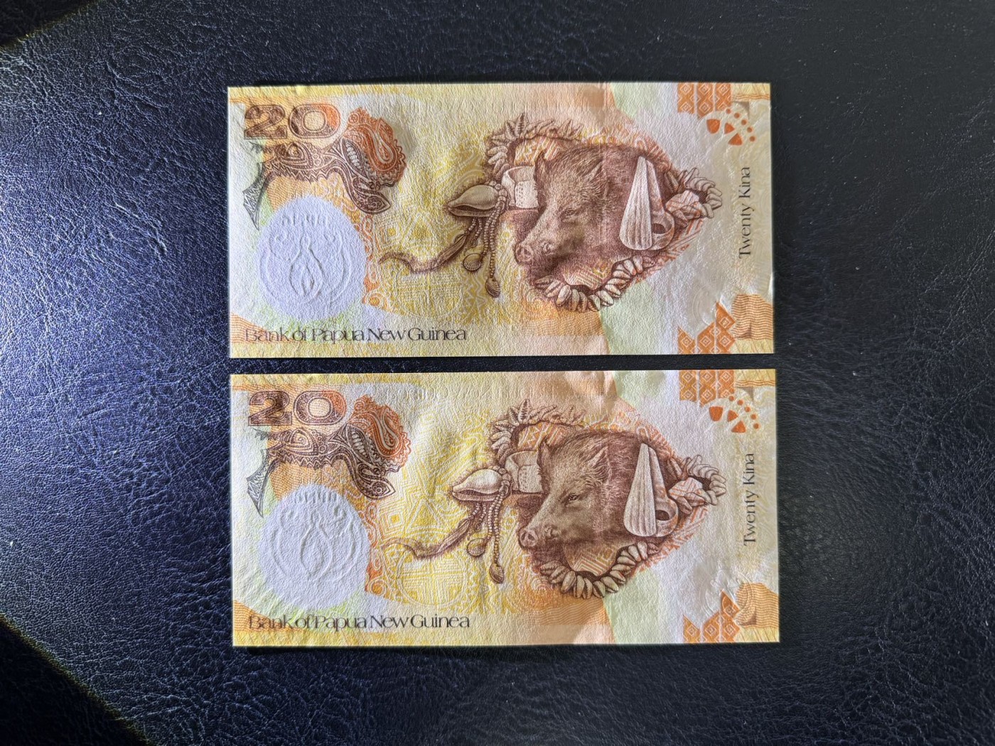 收藏联盟Quantum Auction 第331期拍卖  巴布新几内亚2008年20基纳纪念钞一对 （包括一张ZZZZ补号千位号） 品相全新UNC 边缘瑕疵为正常水印工艺原因