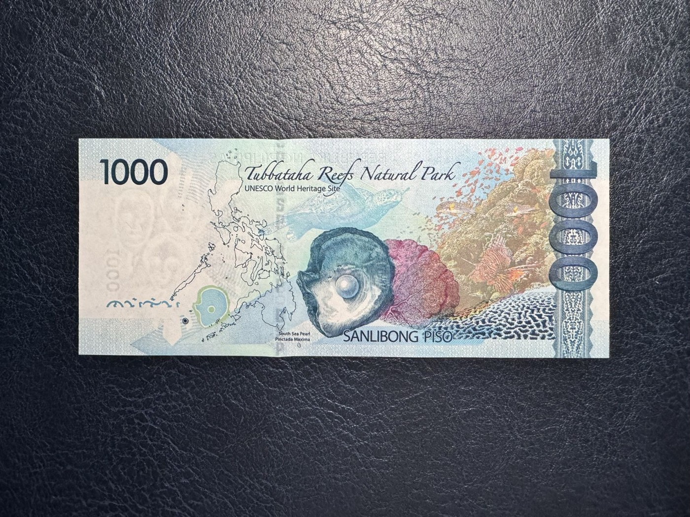 收藏联盟Quantum Auction 第331期拍卖  菲律宾2015年1000比索全同号 品相UNC 角有瑕疵 细节如图