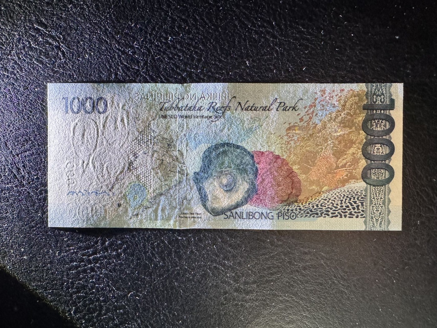 收藏联盟Quantum Auction 第331期拍卖  菲律宾2015年1000比索全同号 品相UNC 角有瑕疵 细节如图