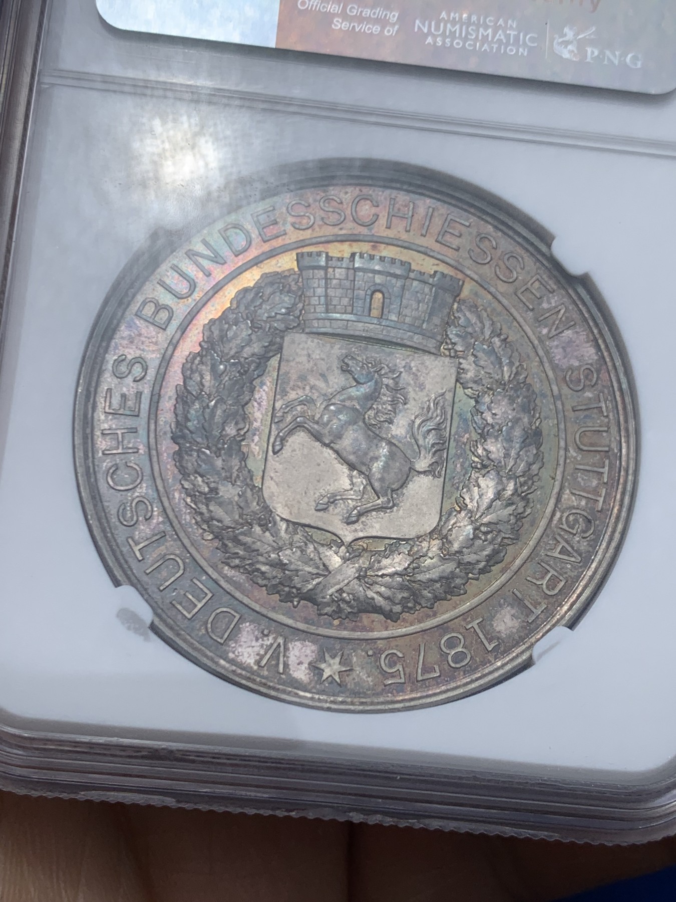 《竞宝斋》第249场-周日，周一 ，周二3场连拍 (全场包邮) NGC MS62 德国1875斯图加特射击节纪念银章 镜面底板 双面五彩包浆