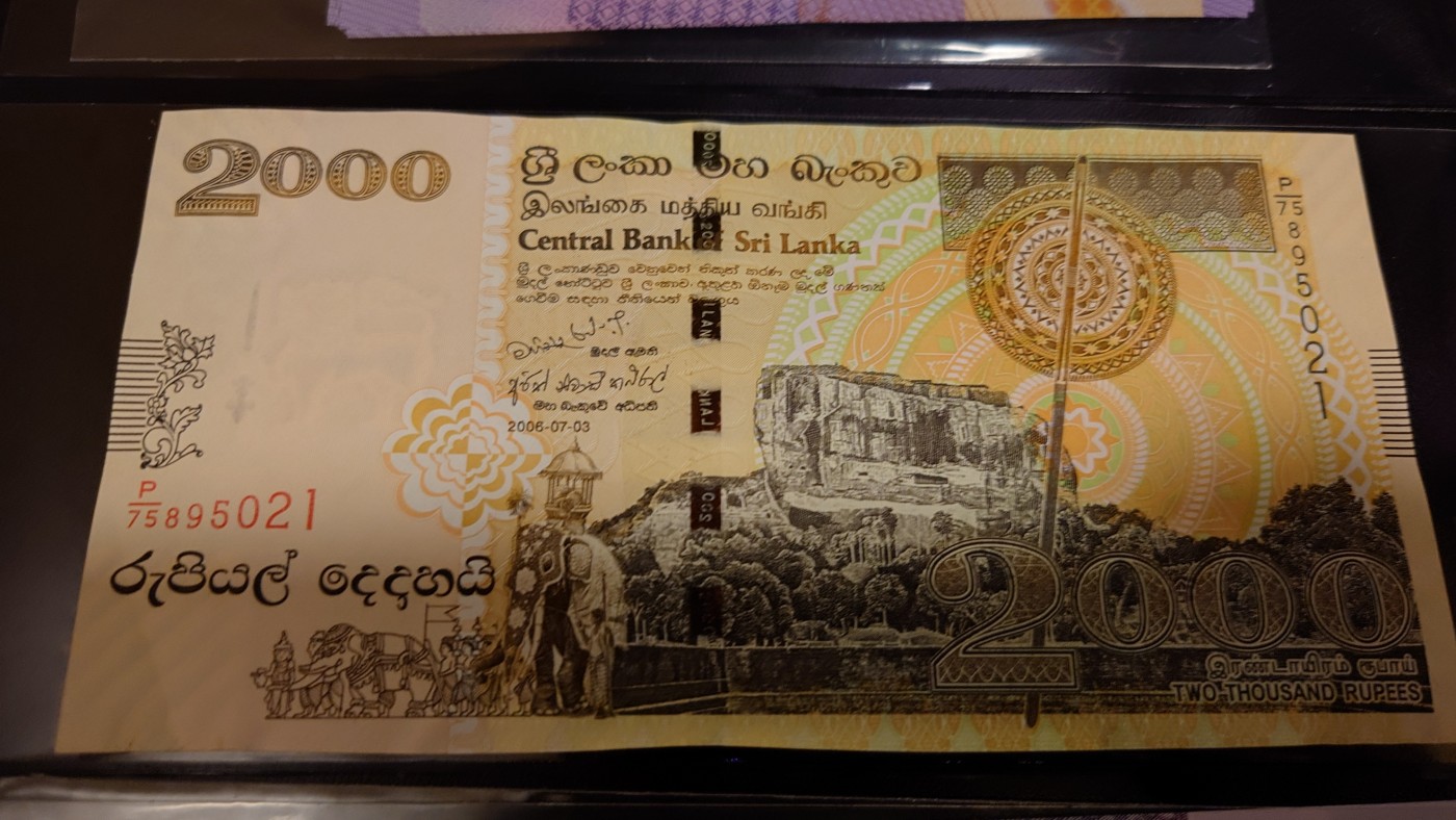 【世界钱币】精选微拍第98期暨2024年第9期  2006年斯里兰卡2000卢比 全新绝品无47尾号021