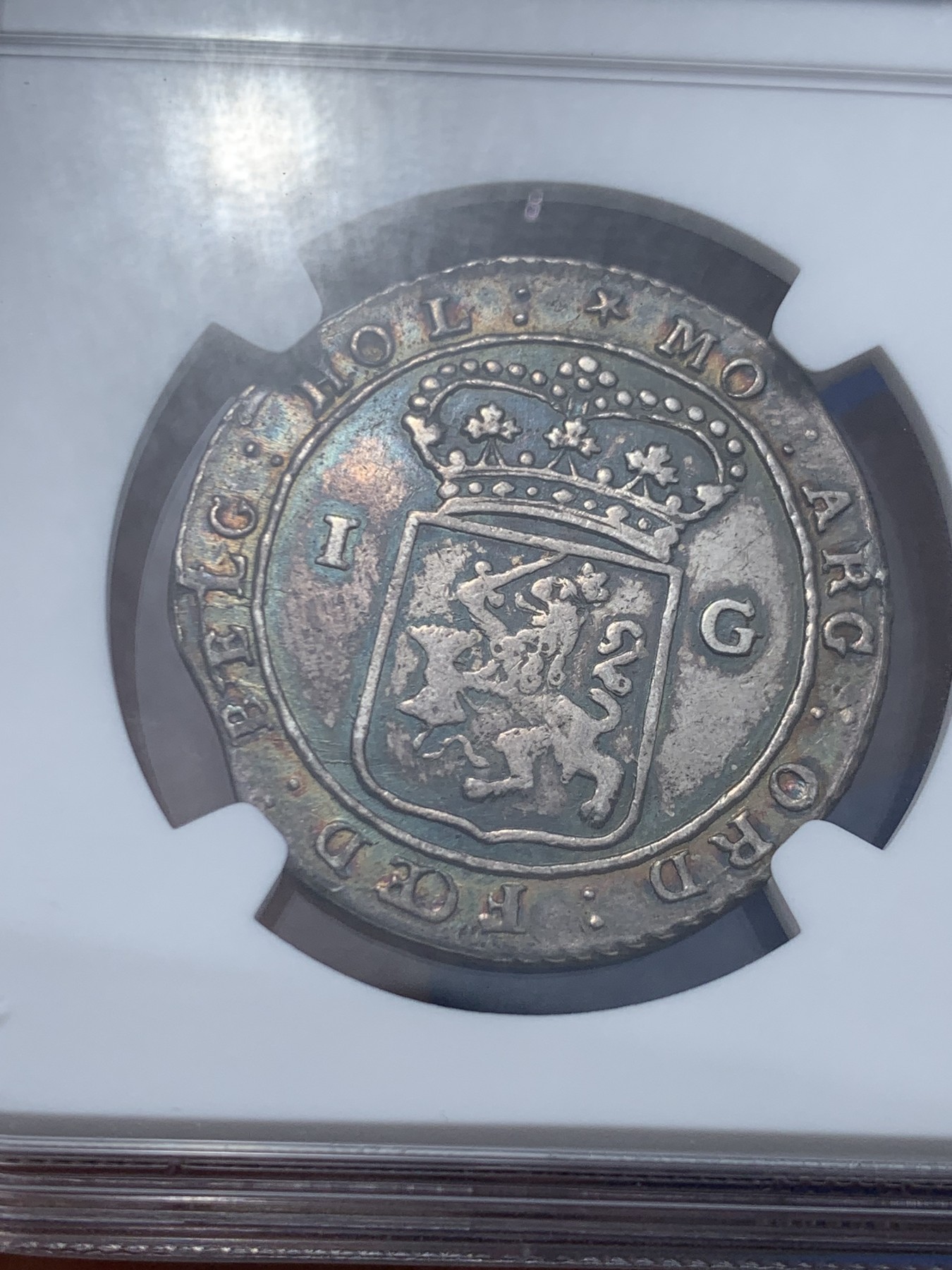 《竞宝斋》第249场-周日，周一 ，周二3场连拍 (全场包邮) NGC AU50 荷属巴达维亚1802年帆船1盾银币 五彩包浆 稀少名誉品