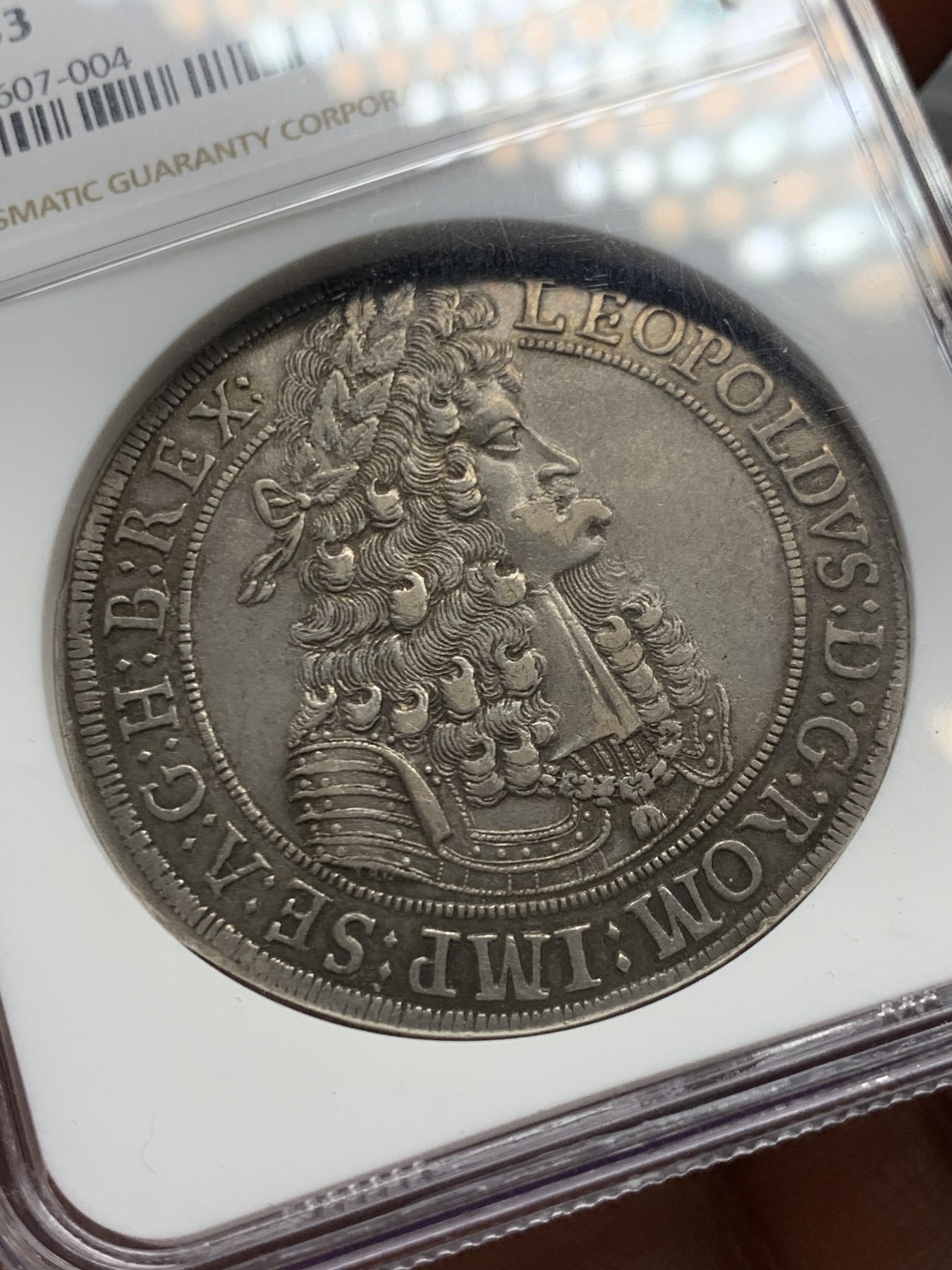 《竞宝斋》第249场-周日，周一 ，周二3场连拍 (全场包邮) 严评亚军分 NGC AU53 神圣罗马帝国1696/5骑字版 利奥波德一世大波浪 猪嘴 泰勒 银币 打制不错 状态非常好
